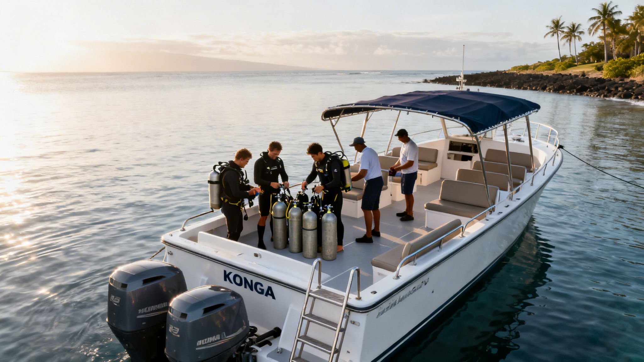 Scuba divers and crew prepare gear on a boat at sunrise in Hawaii, ready for a dive.