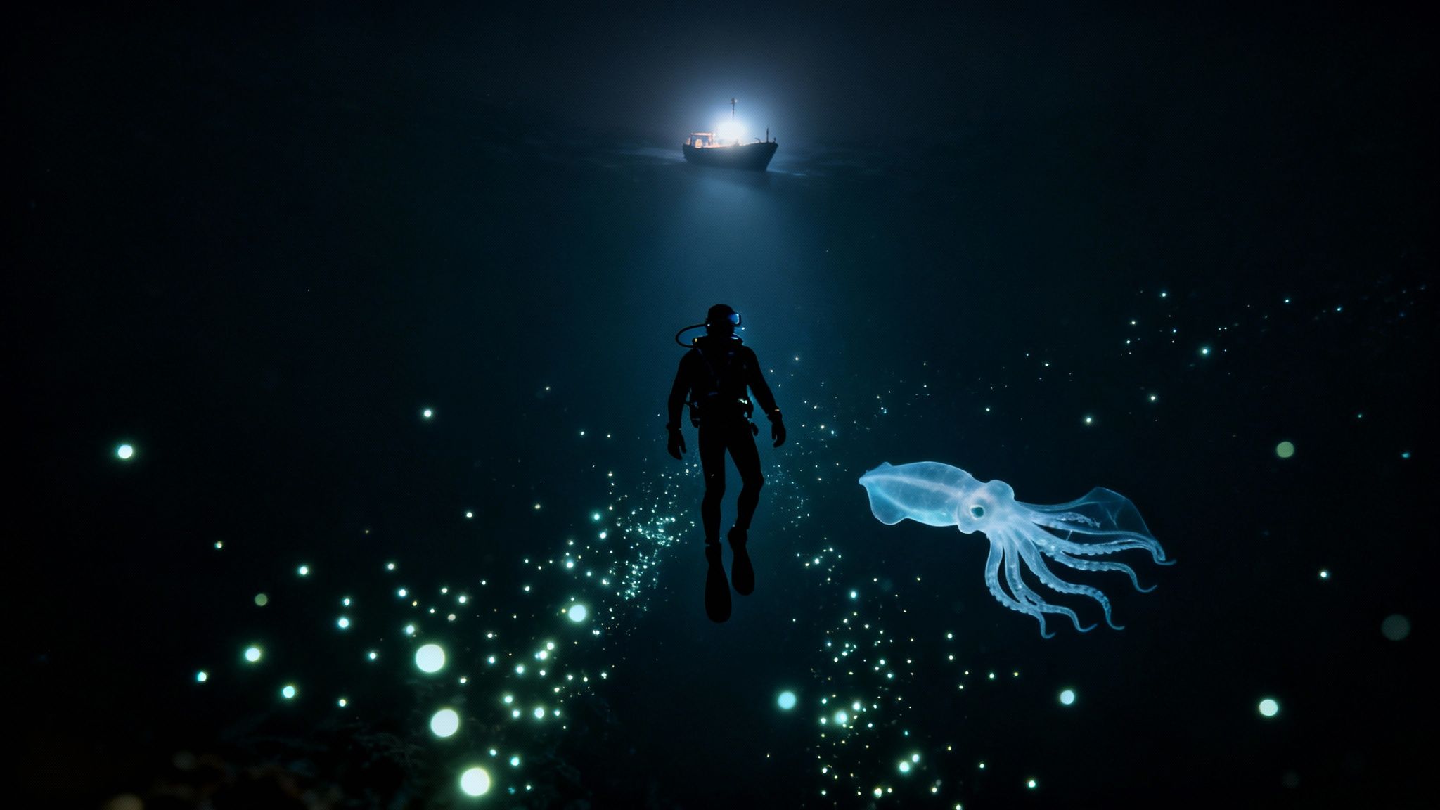 A diver, a glowing squid, and bioluminescent plankton illuminate a deep ocean scene below a boat.