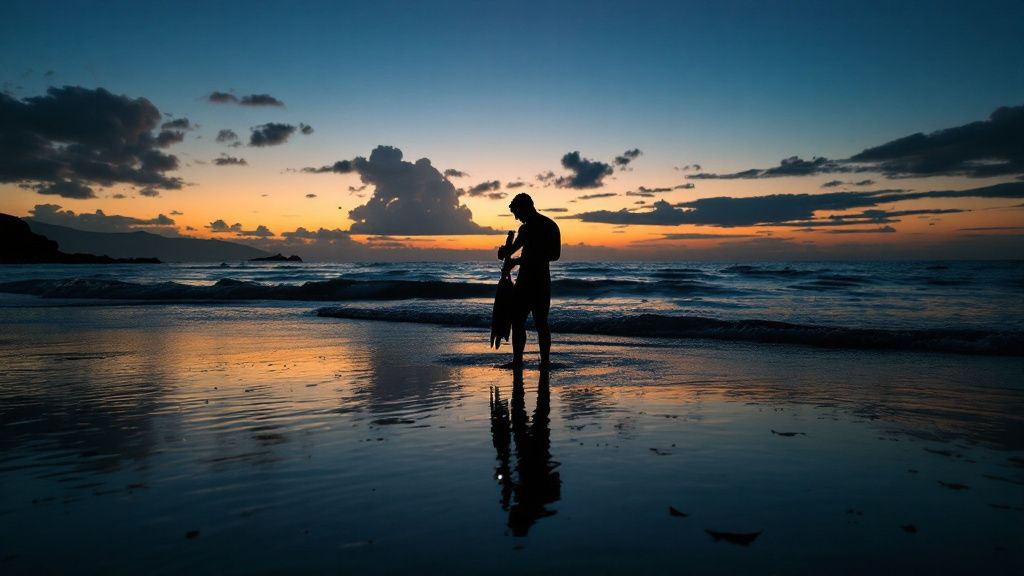Divers watching a manta ray glide overhead during a night dive in Kailua Kona.