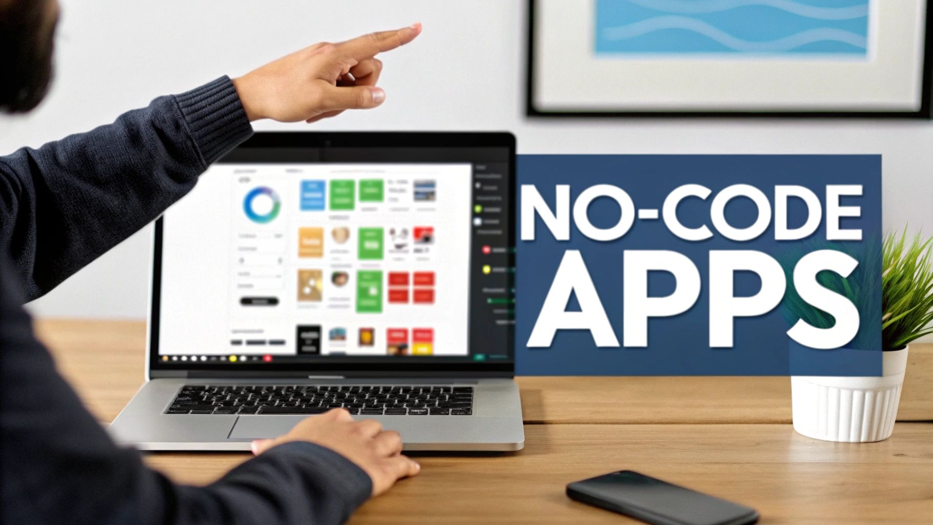 Person pointing at a laptop screen displaying a no-code app builder, with a 'NO-CODE APPS' banner.
