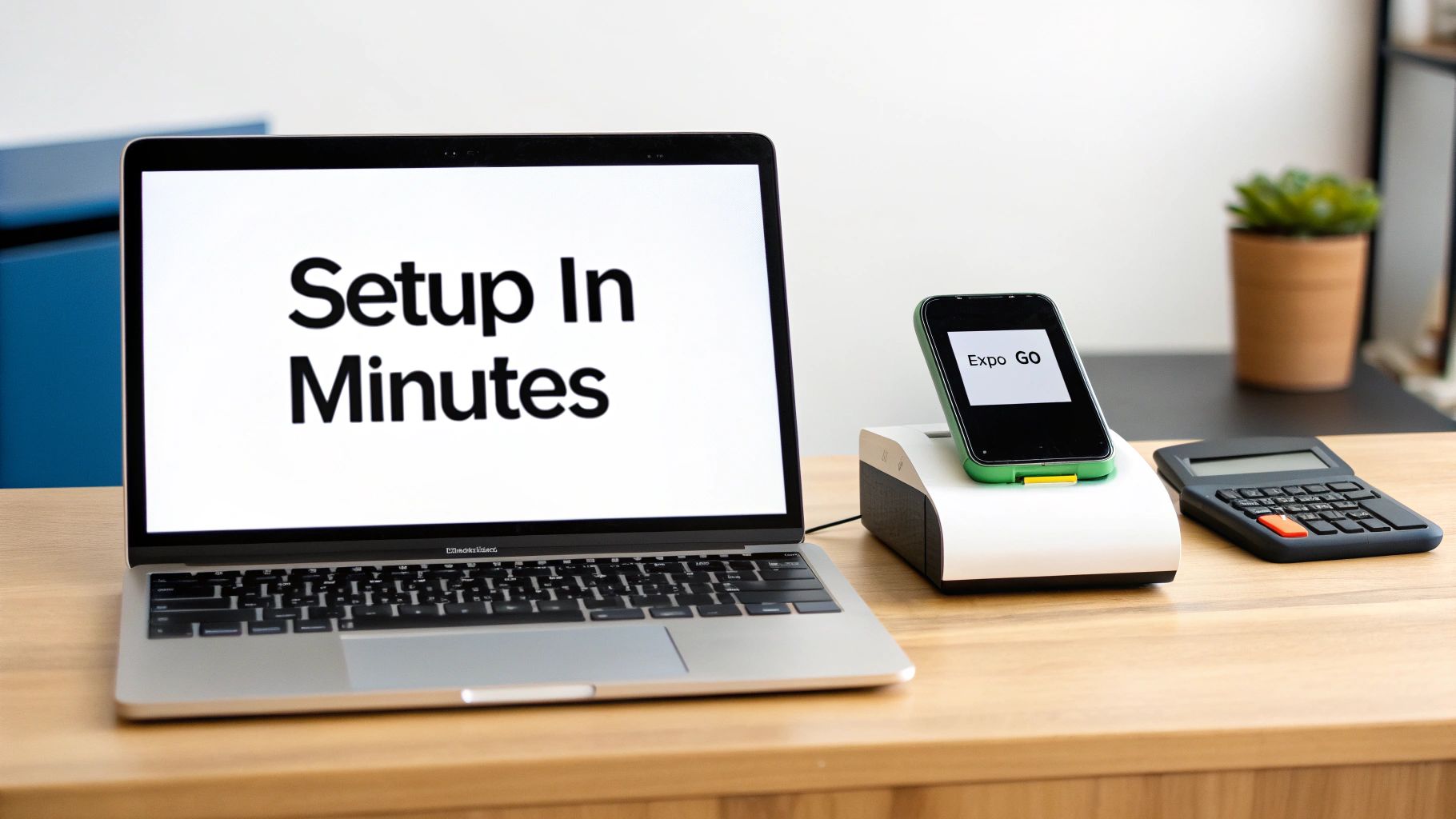 A laptop screen displays 'Setup In Minutes' next to a mobile payment device showing 'Expo GO' and a calculator on a wooden desk.