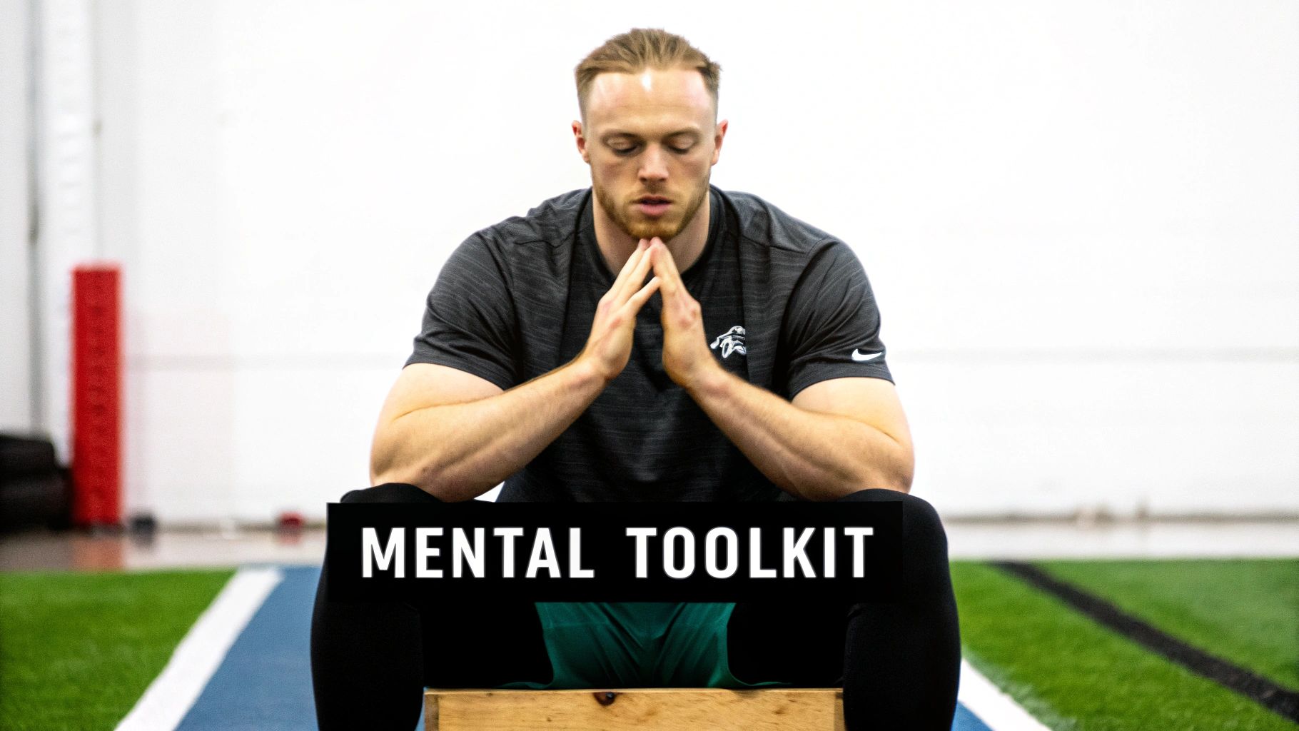 A male athlete with closed eyes and clasped hands, meditating in a gym, with 'MENTAL TOOLKIT' text.