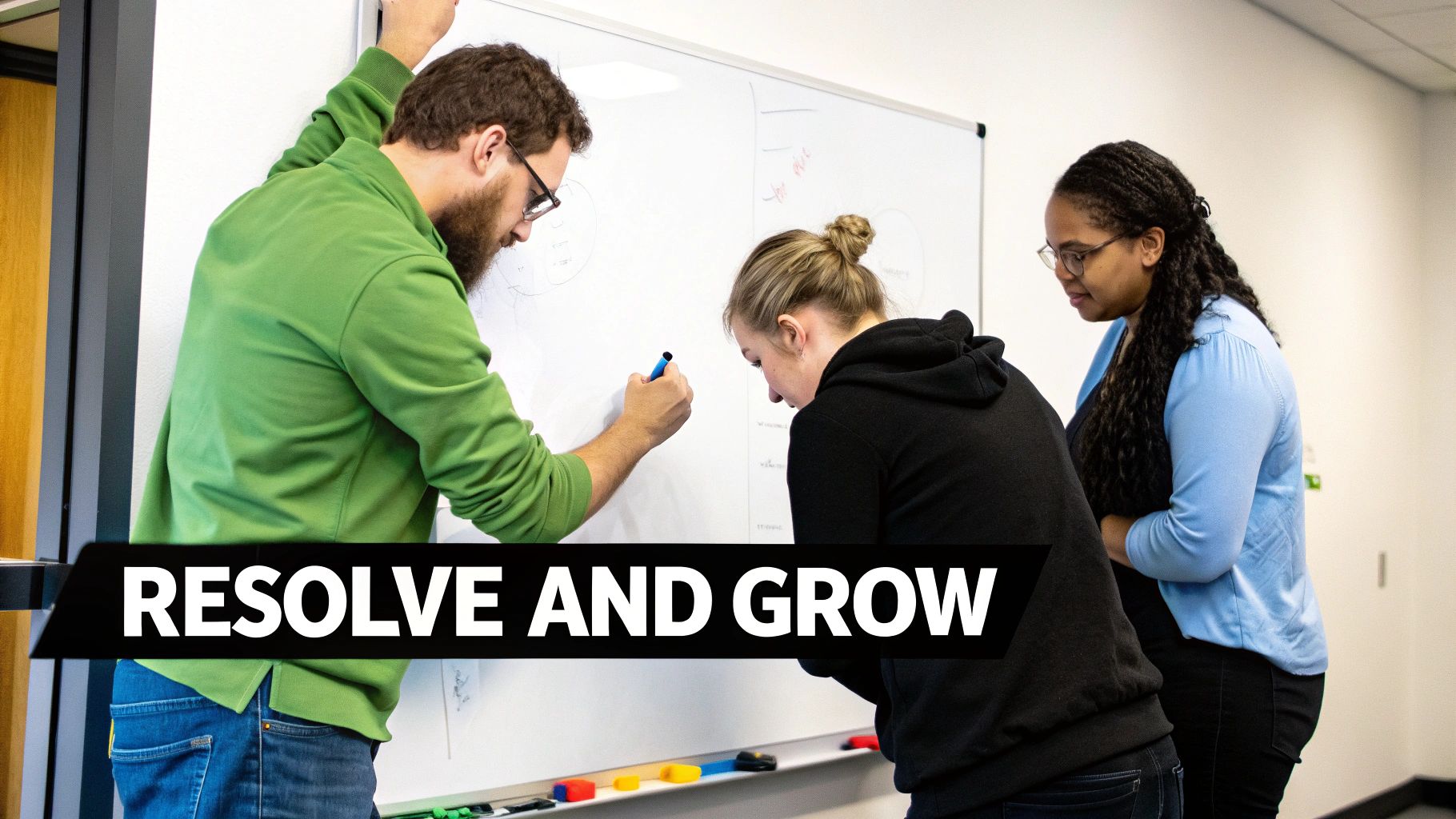 Three diverse colleagues brainstorming ideas on a whiteboard in an office setting.