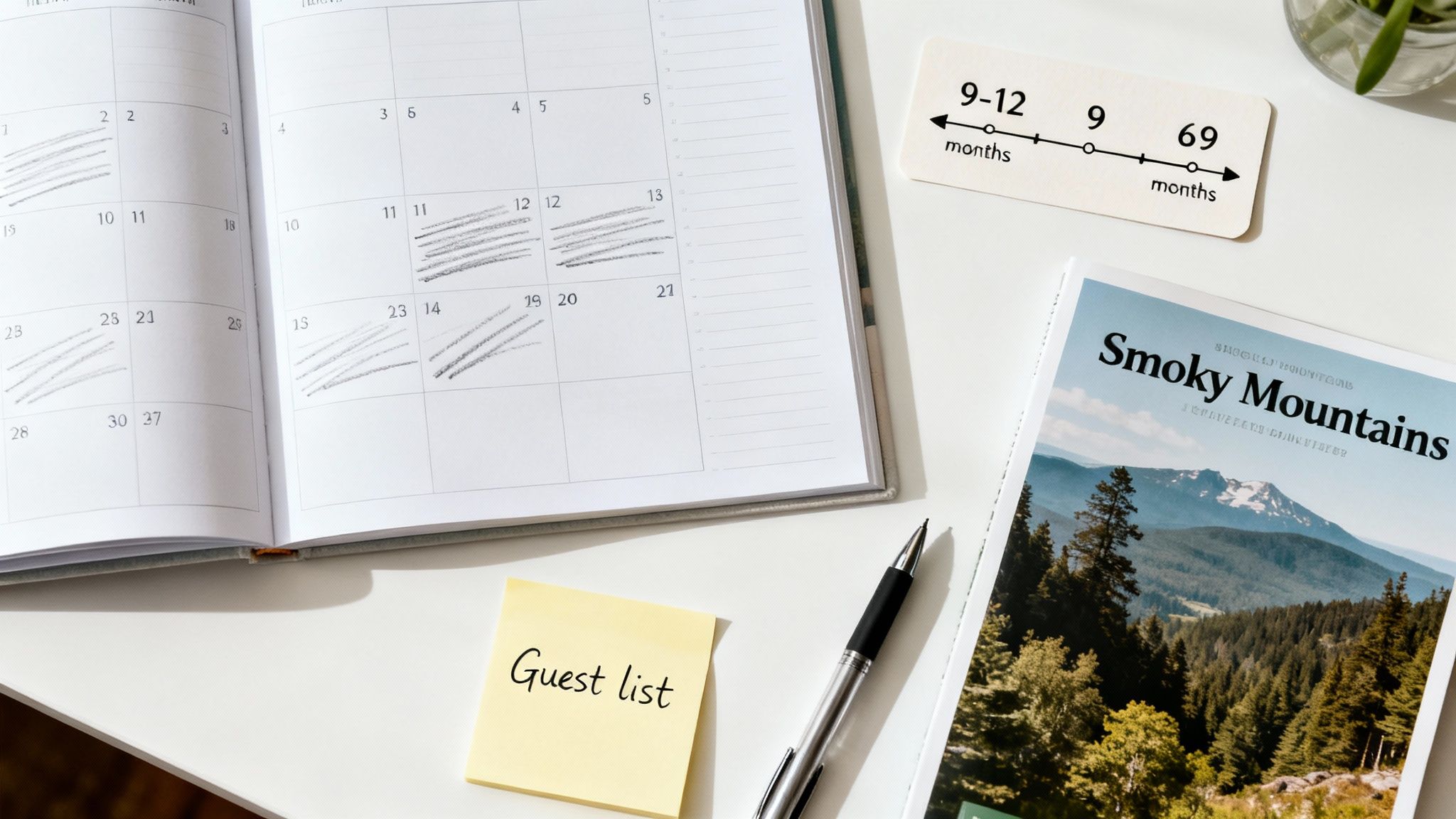 A calendar with marked dates, 'Guest list' sticky note, Smoky Mountains brochure, and a planning timeline card.