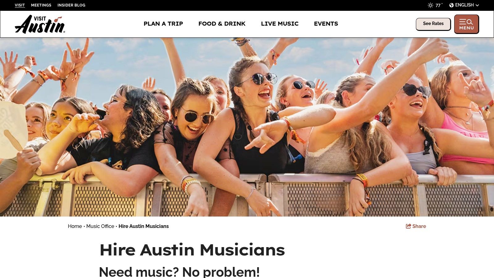 A large concert crowd enjoying a live band performance at an event in Austin, TX.