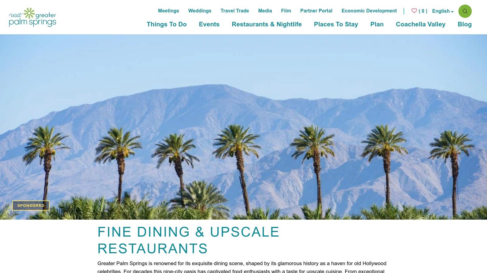 A scenic view of Palm Springs with palm trees set against a mountain backdrop.