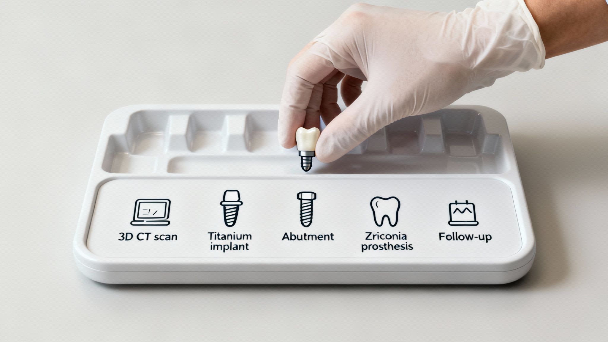 A gloved hand places a dental implant model onto a tray illustrating the steps of the procedure.