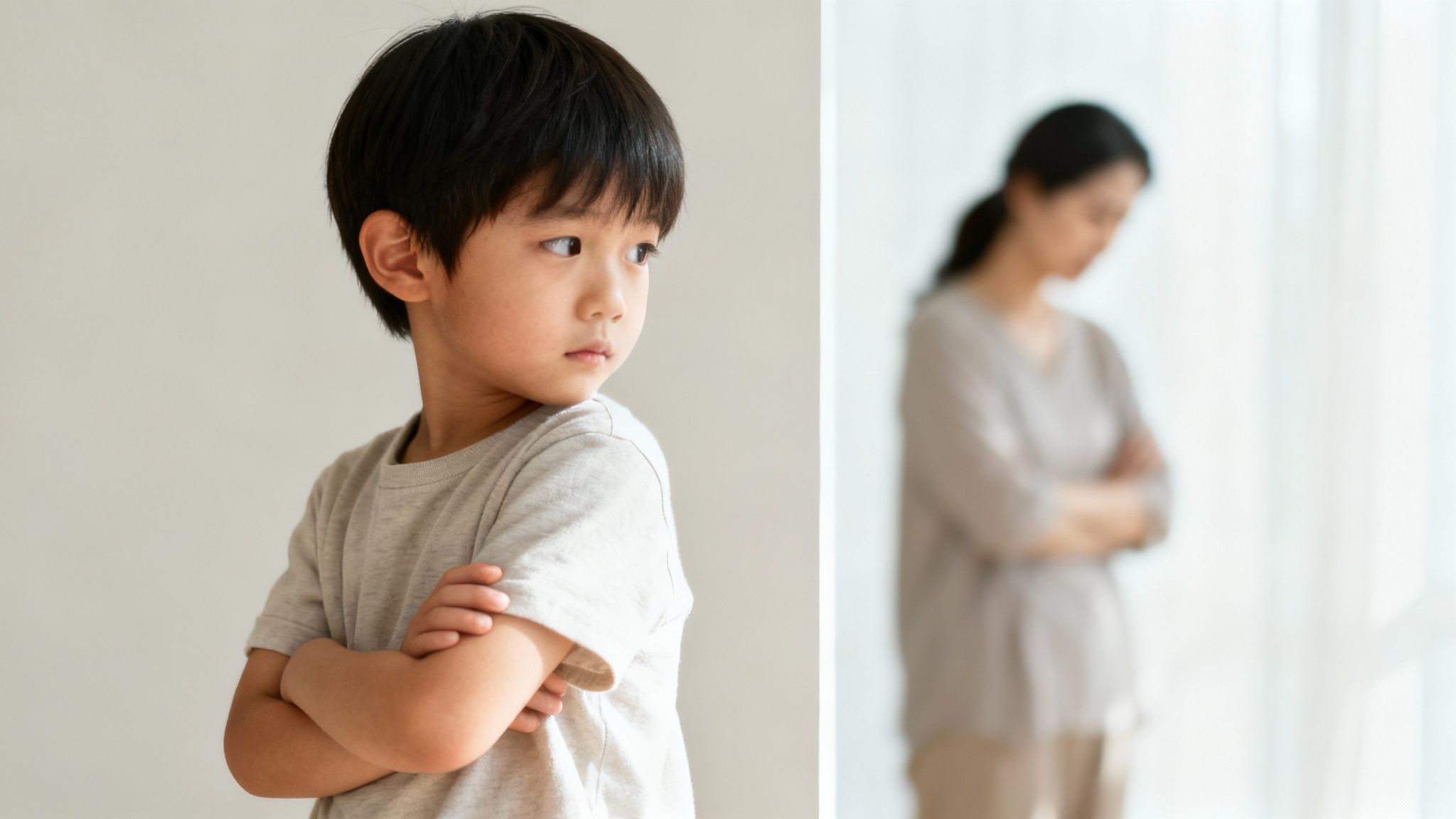 A child looking sad and distant from a parent