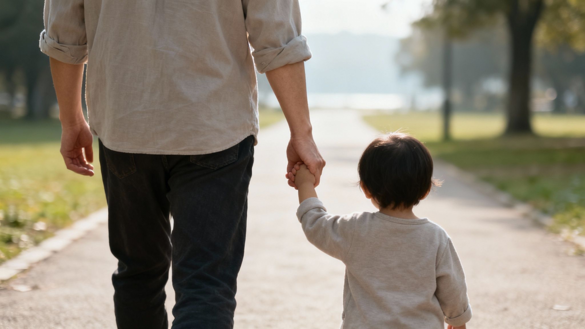 A parent comforting their child, representing the emotional weight of custody decisions.