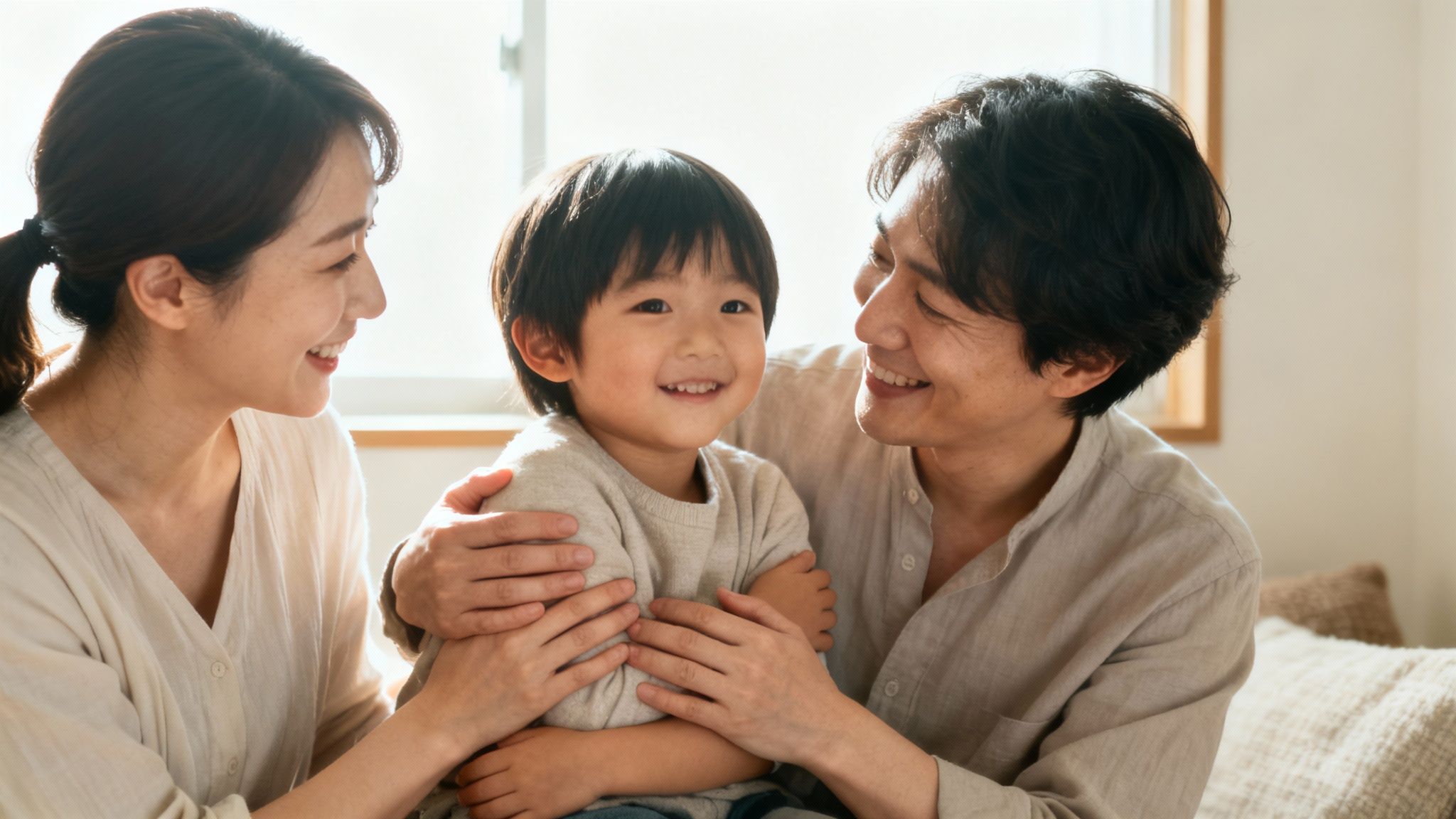 A happy, diverse family group smiling together outdoors, representing a new beginning.