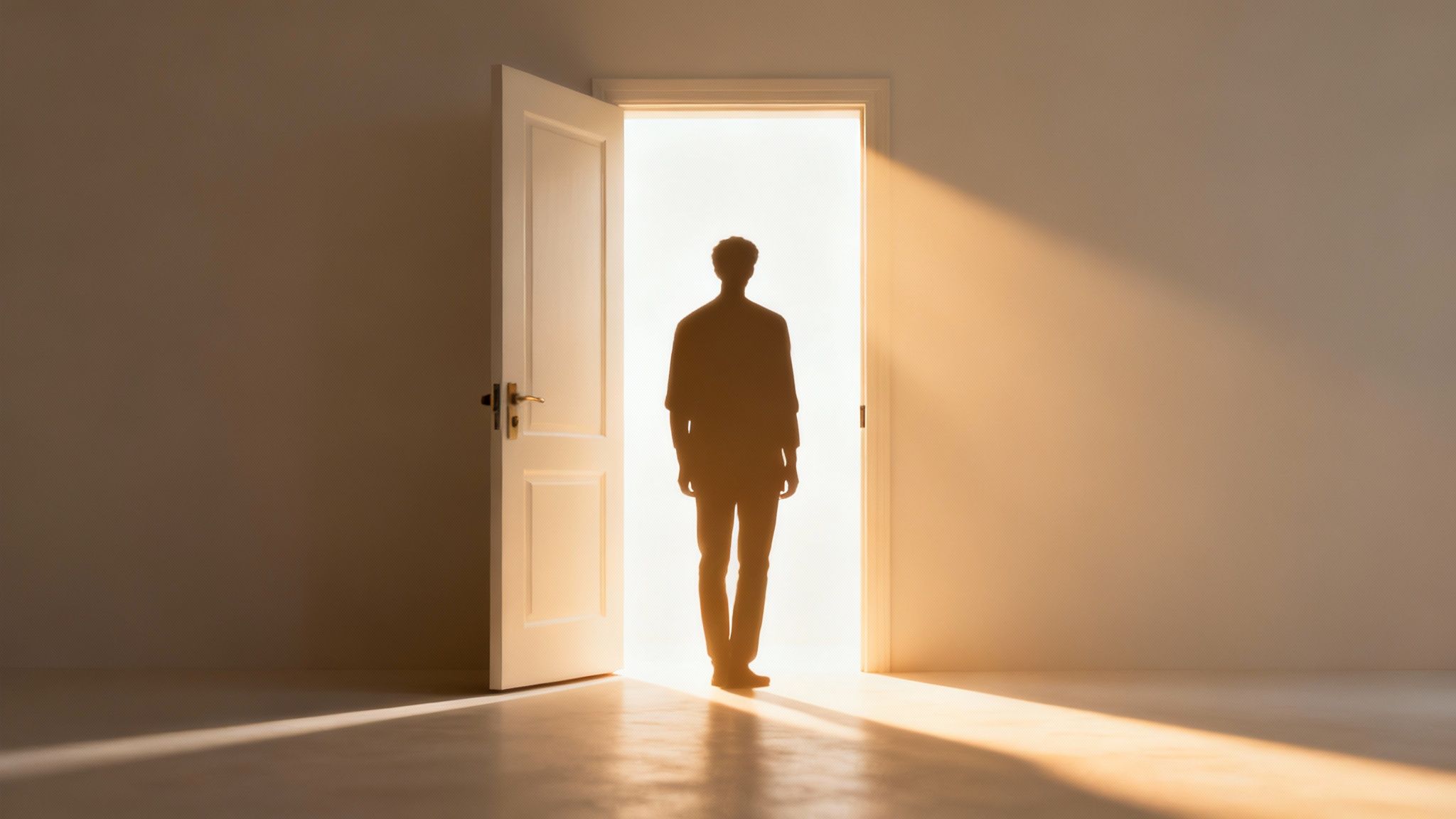 A person with arms outstretched, facing a bright future, symbolizing freedom and new opportunities.