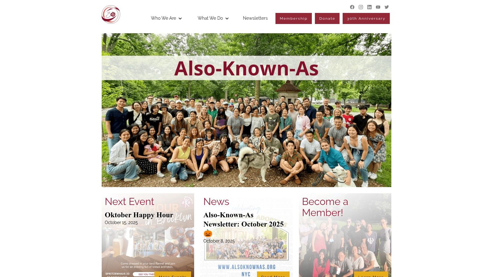 Group of diverse adoptees and supporters gathered outdoors for Also-Known-As community event, featuring a dog and a welcoming atmosphere, emphasizing connection and support for transracial and intercountry adoptees.