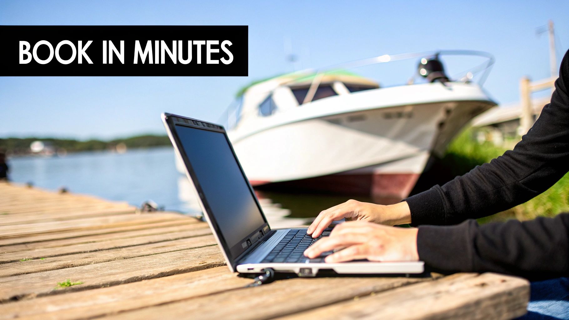 Person typing on a laptop on a wooden dock by the water with a boat in the background, text 'BOOK IN MINUTES'.