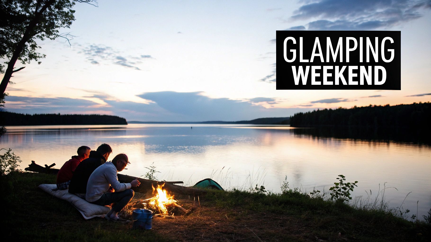 A group of friends enjoying a glamping weekend by a lake, gathered around a warm campfire at sunset.