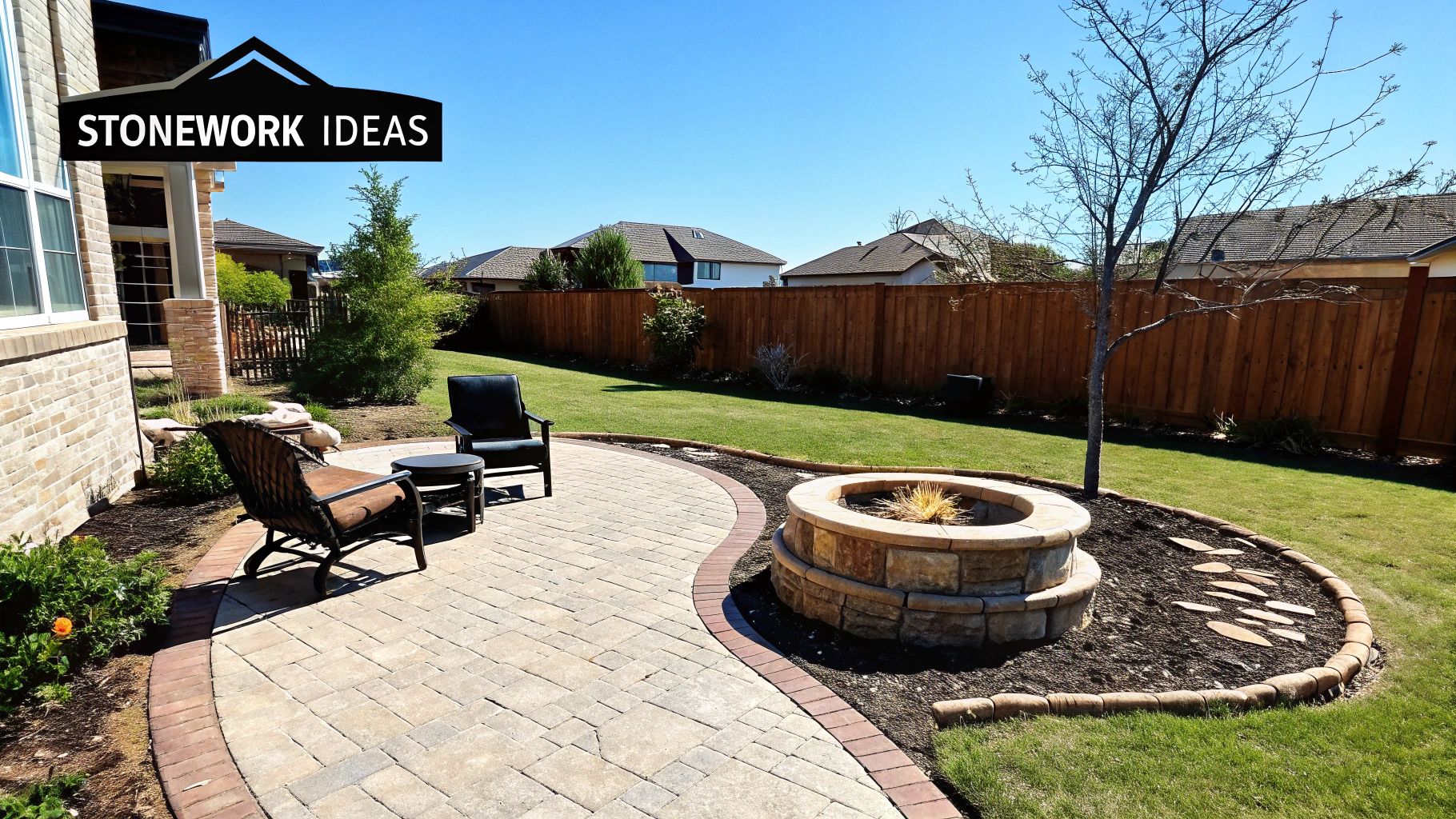 Backyard with a curved stone patio, outdoor seating, a multi-tiered fire pit, and green grass.