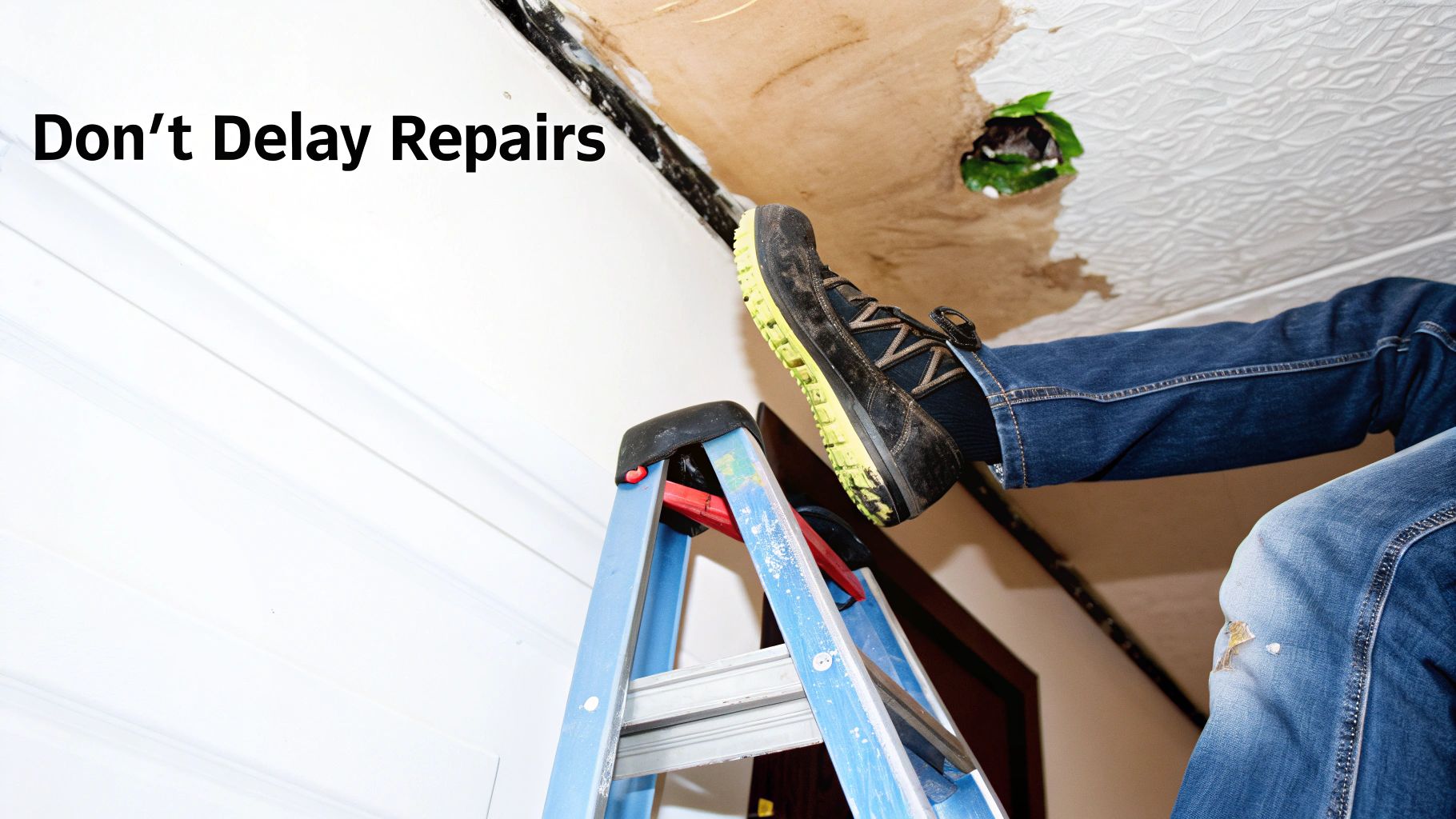 A water-damaged ceiling with visible stains, illustrating the consequences of a delayed roof repair.