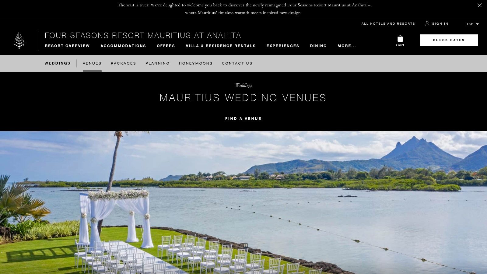 An elegant outdoor wedding reception setup at dusk at the Four Seasons Resort Mauritius at Anahita.