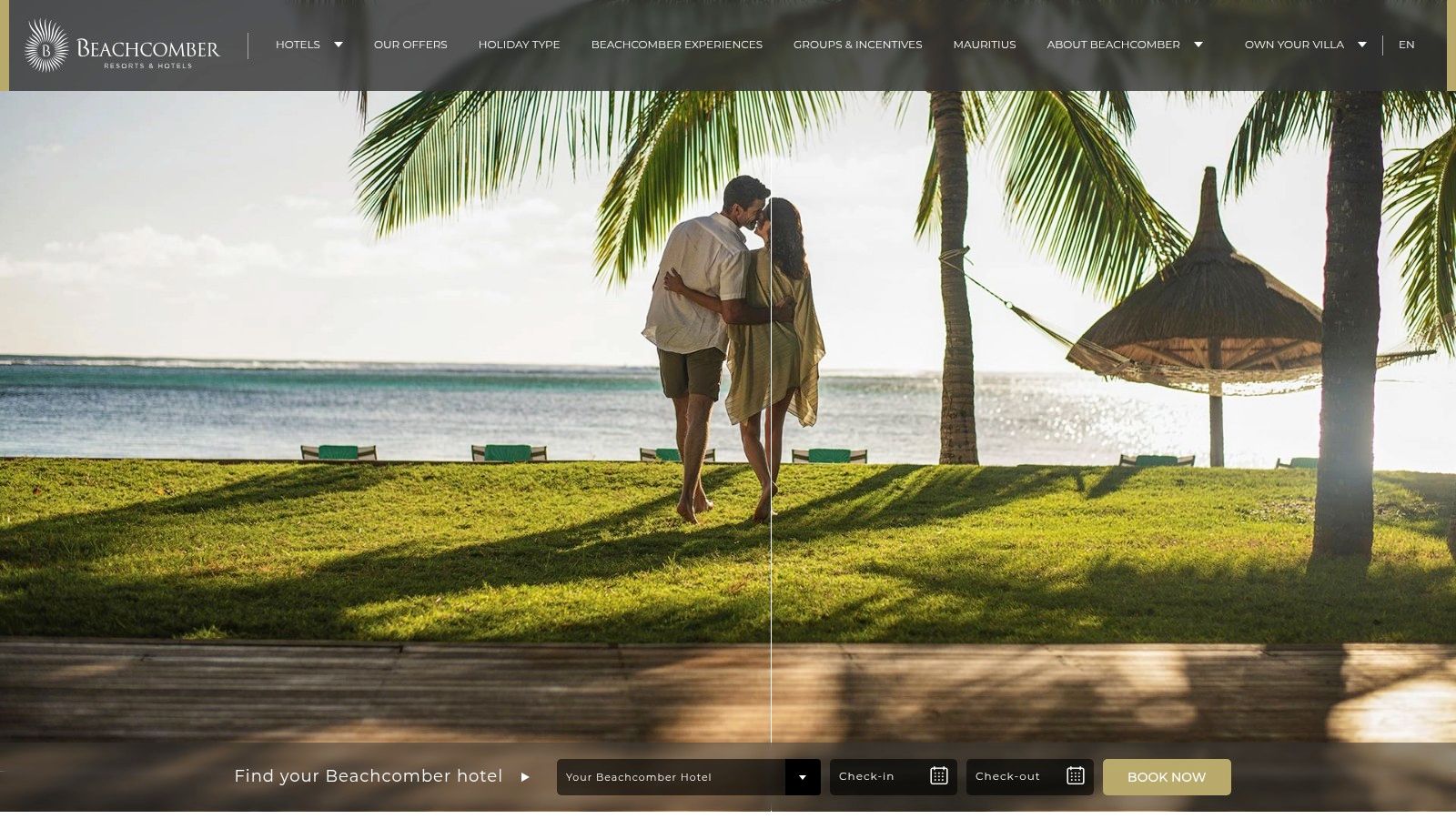A couple on their honeymoon in Mauritius enjoying the beach at a Beachcomber resort