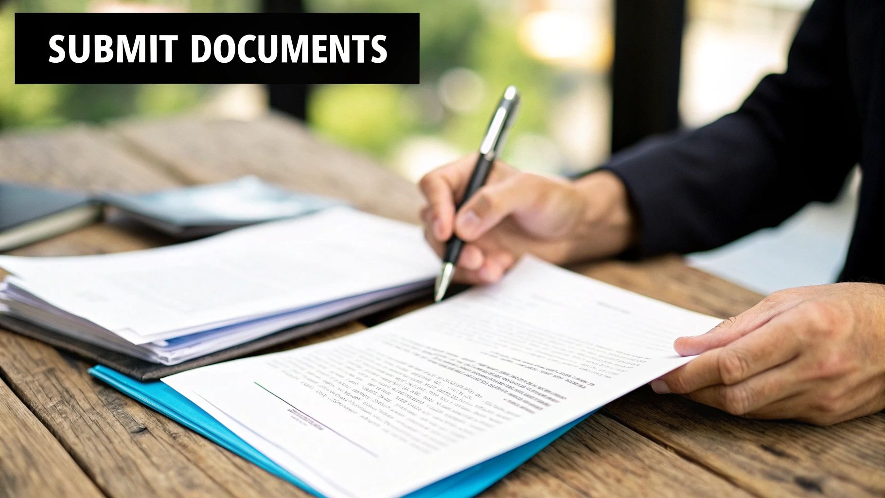 A person stacking coins on a table to represent savings.