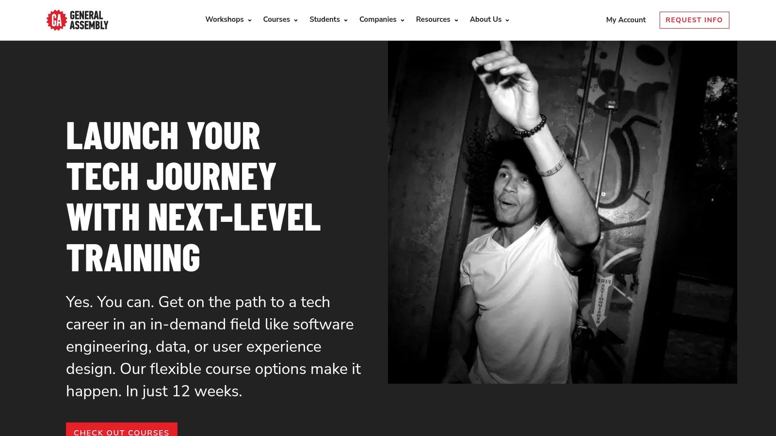 A classroom setting with students learning on laptops, representing General Assembly's structured educational environment for tech and creative skills like podcasting.