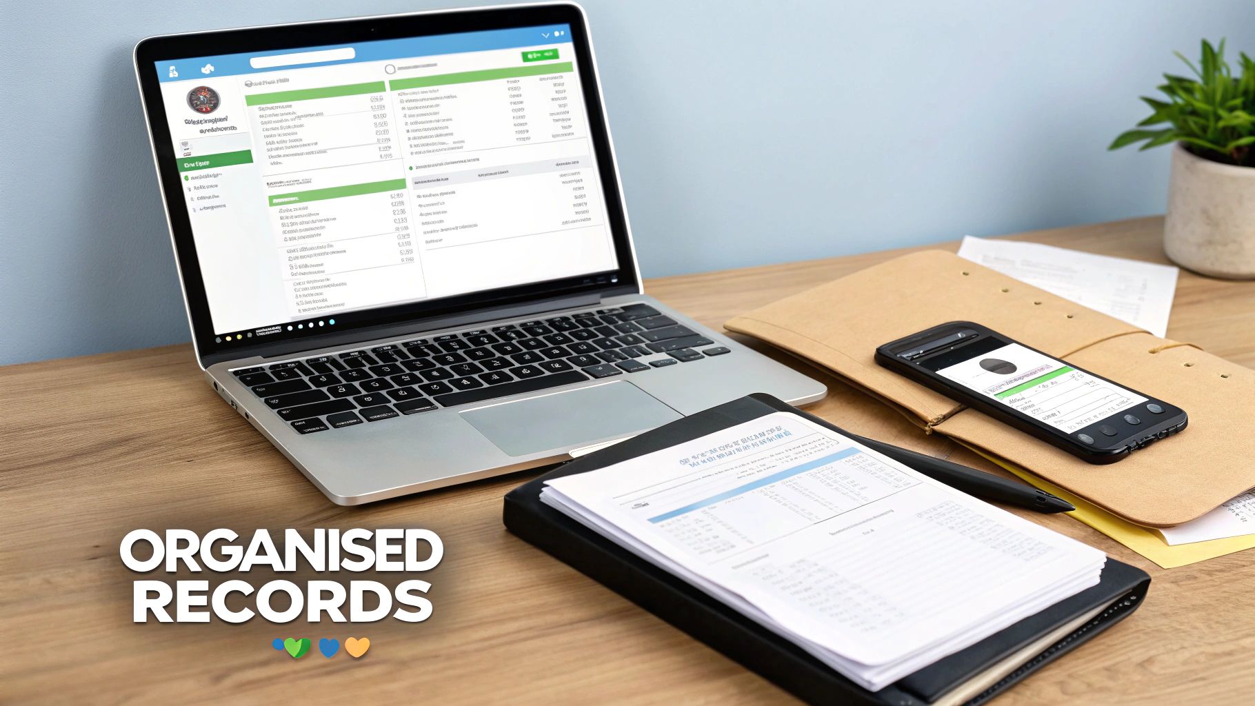 A laptop, smartphone, and organized documents on a desk, representing efficient record keeping.