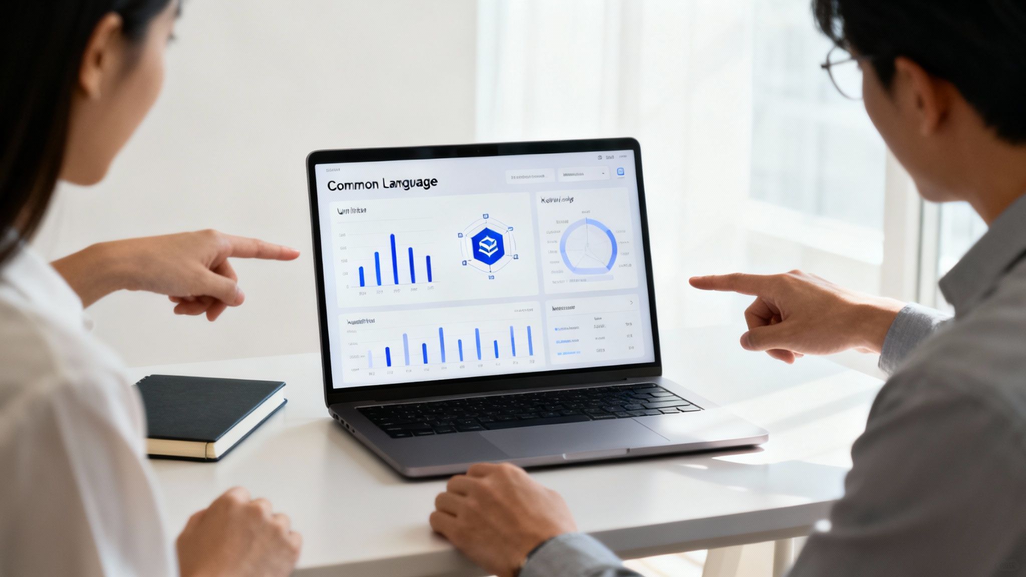 People collaborating on a project, representing the breakdown of organizational silos