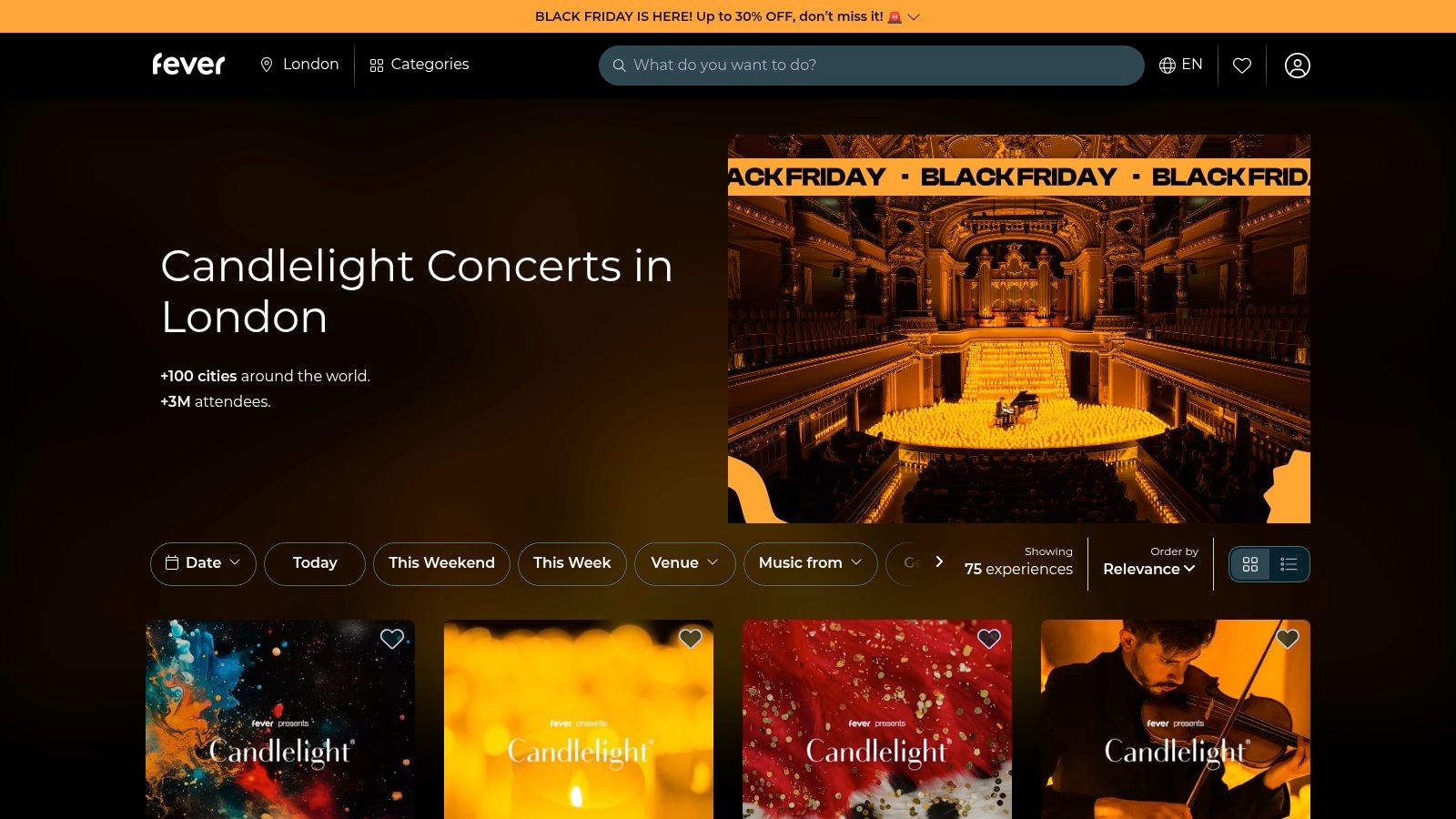 A string quartet performing surrounded by candles at a Fever Candlelight concert in London