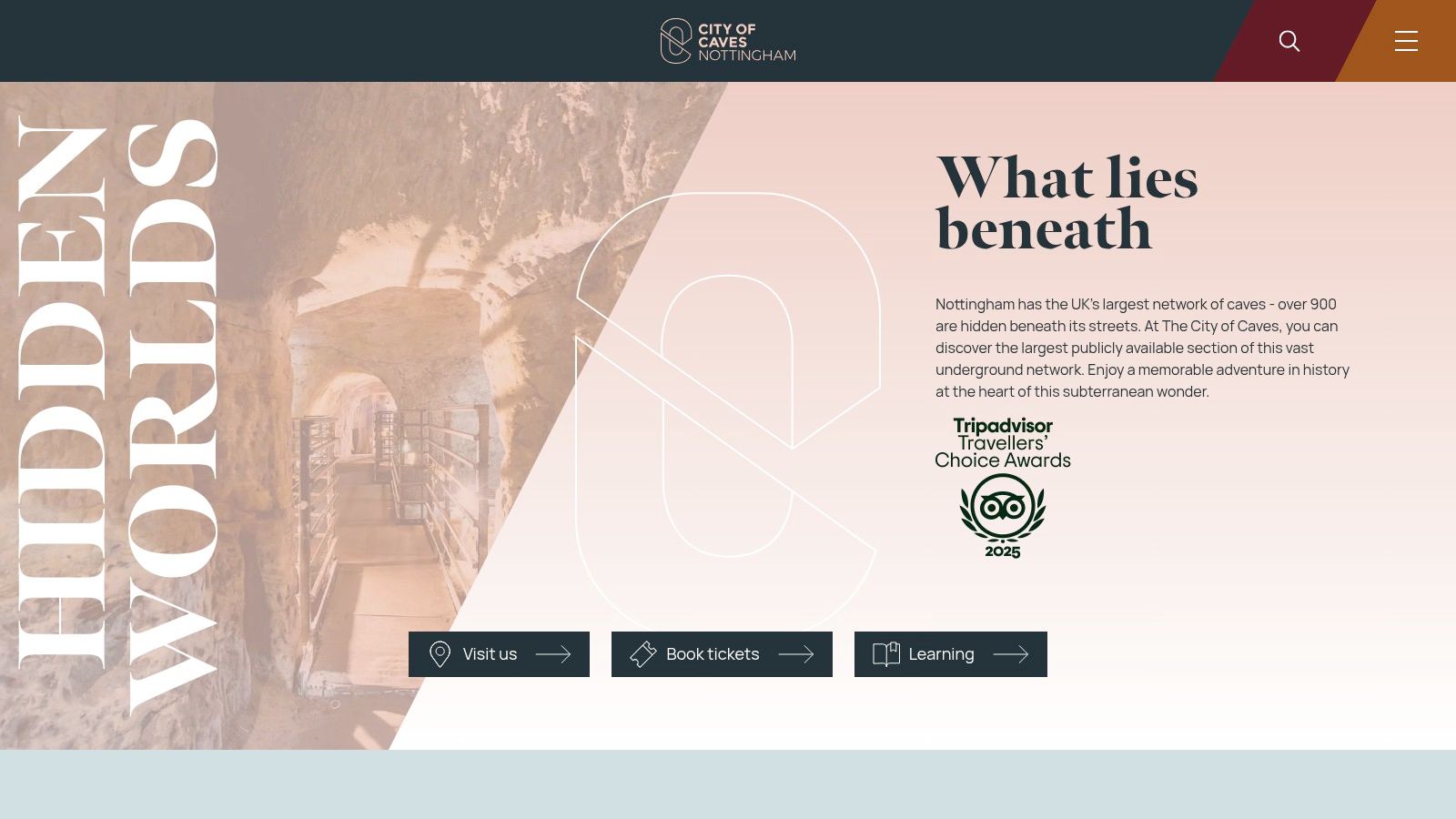 A tour guide leading visitors through the historic City of Caves network in Nottingham