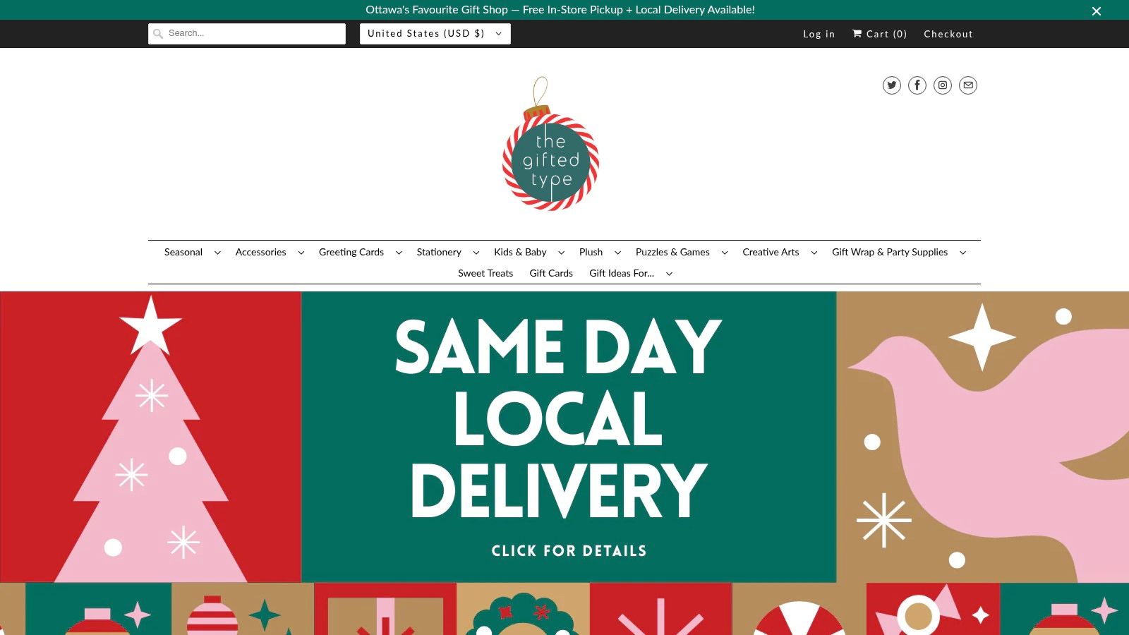 A festive interior view of The Gifted Type during the holiday season, with warm lighting and displays of cards, books, and unique gifts.