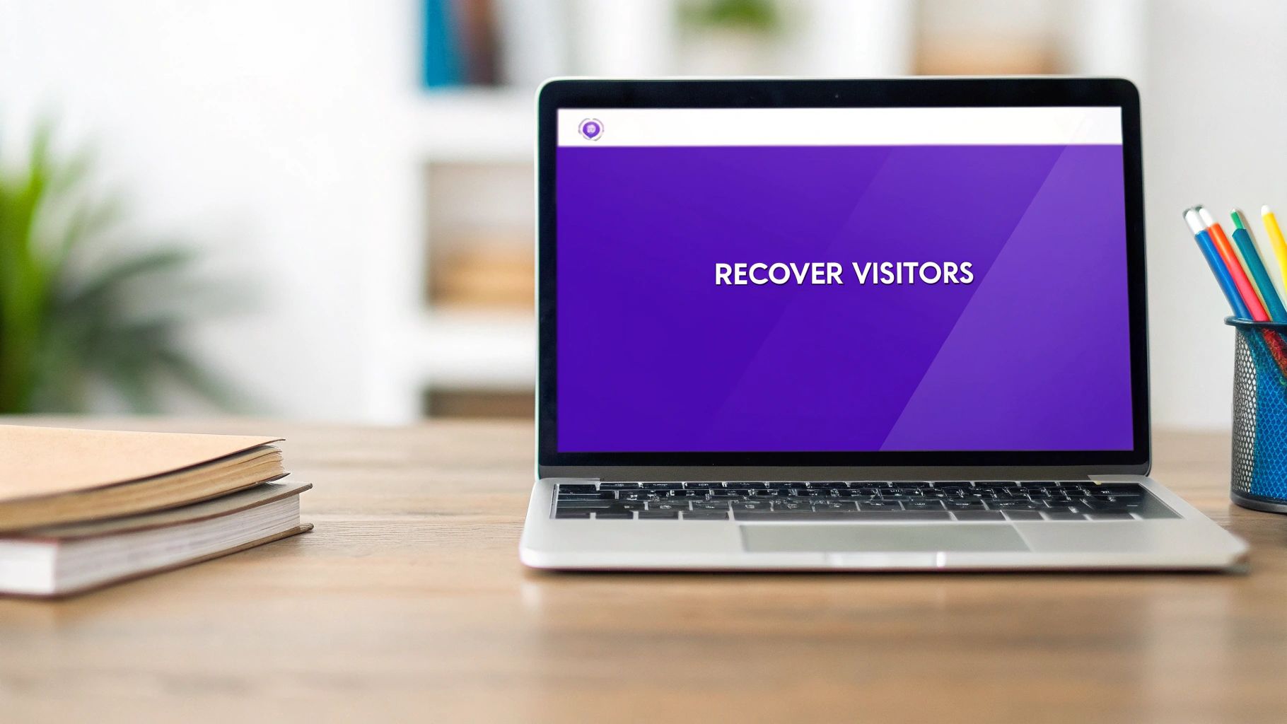 A person working on a laptop with a pop-up graphic overlayed, illustrating the concept of exit-intent technology.