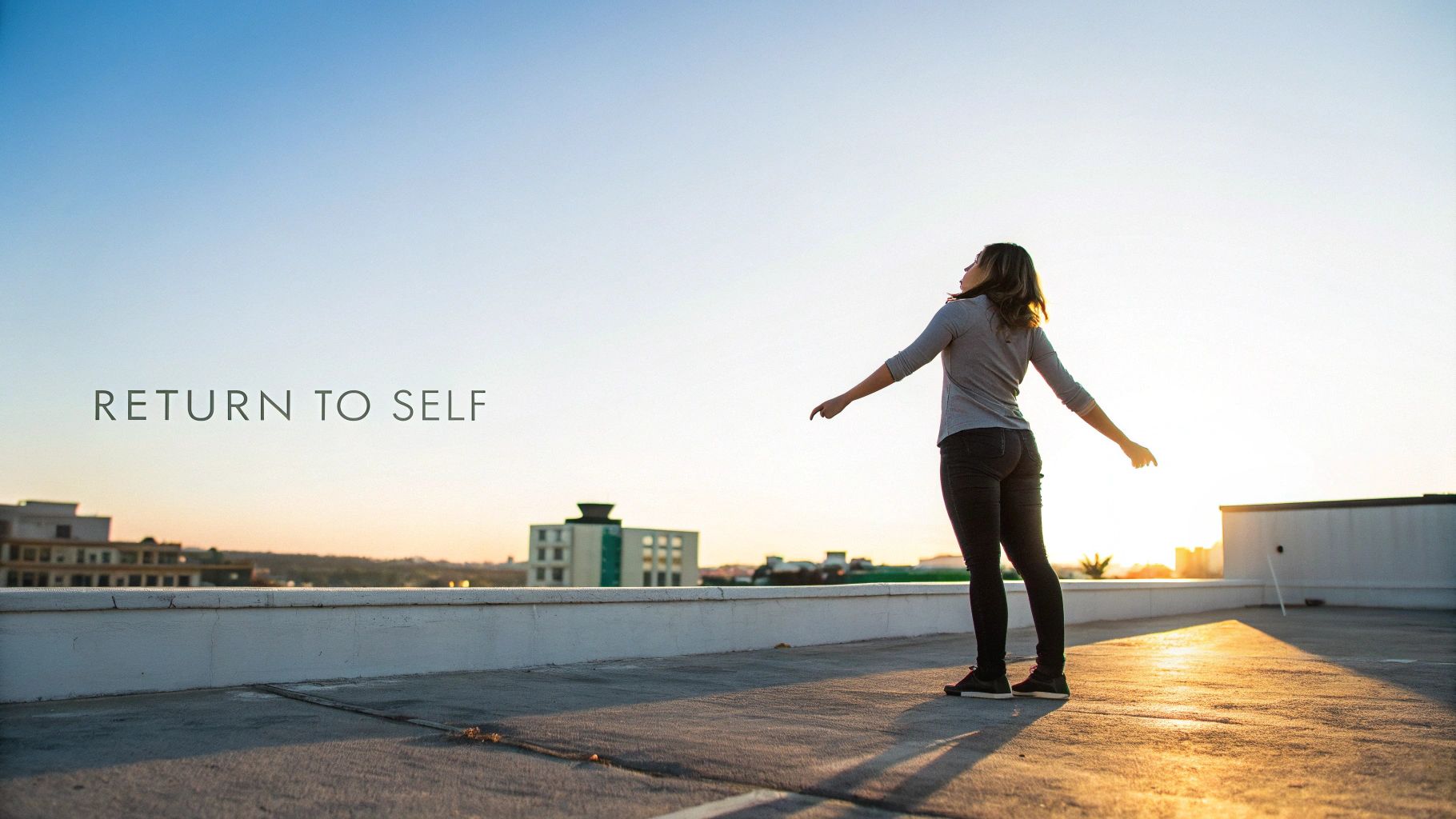 Woman on a rooftop at sunset with outstretched arms, text reads 'RETURN TO SELF'.