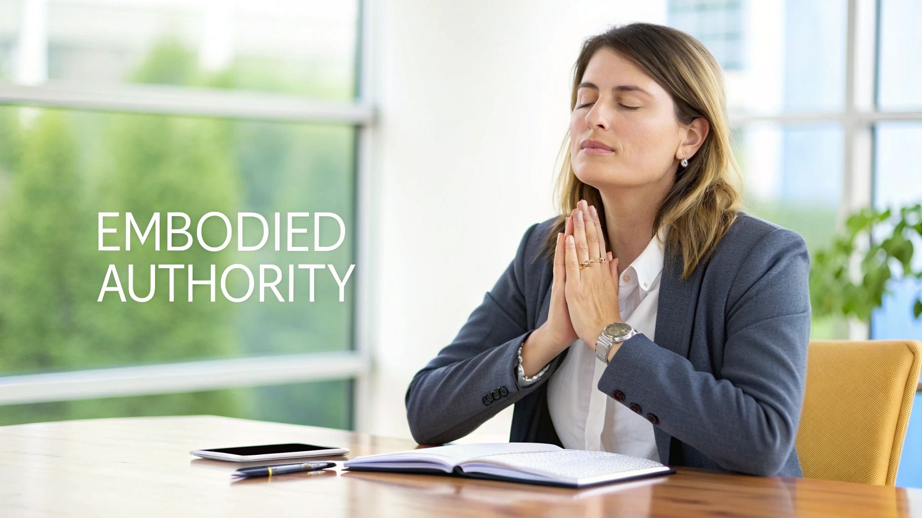 A businesswoman with closed eyes meditating at her office desk, hands in prayer pose, with 'EMBODIED AUTHORITY' text. A businesswoman with closed eyes meditating at her office desk, hands in prayer pose, with 'EMBODIED AUTHORITY' text.