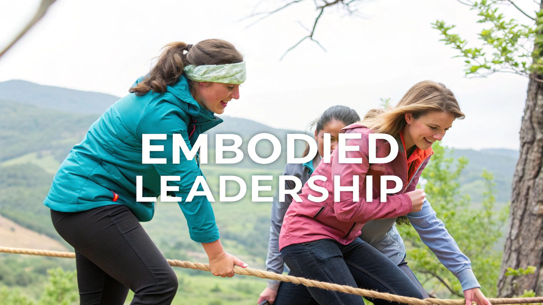 Three smiling women participate in an outdoor team-building activity, holding a rope, with 'EMBODIED LEADERSHIP' text. Three smiling women participate in an outdoor team-building activity, holding a rope, with 'EMBODIED LEADERSHIP' text.