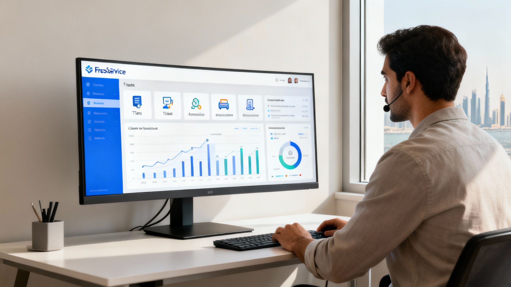 Man with headset working at desk, viewing FreshService dashboard with city skyline outside window.