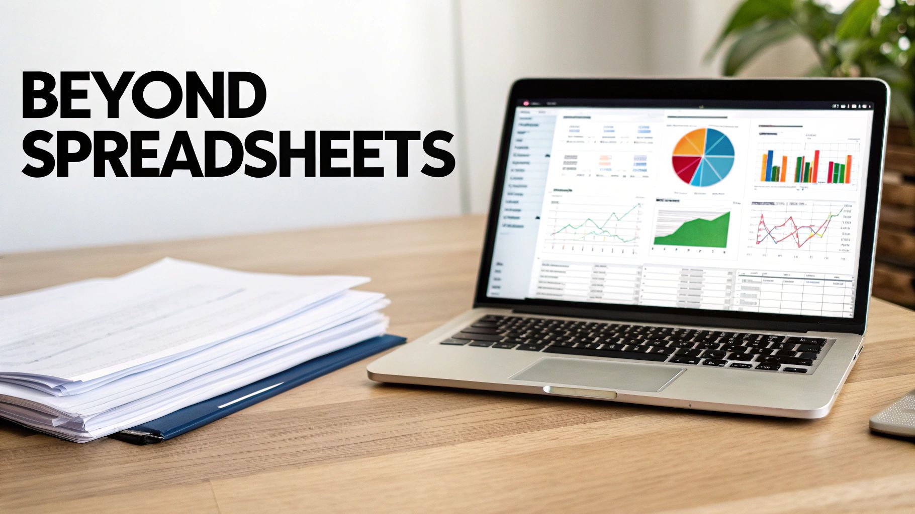 Laptop displaying financial data dashboards with charts, graphs, and business analytics visualizations.