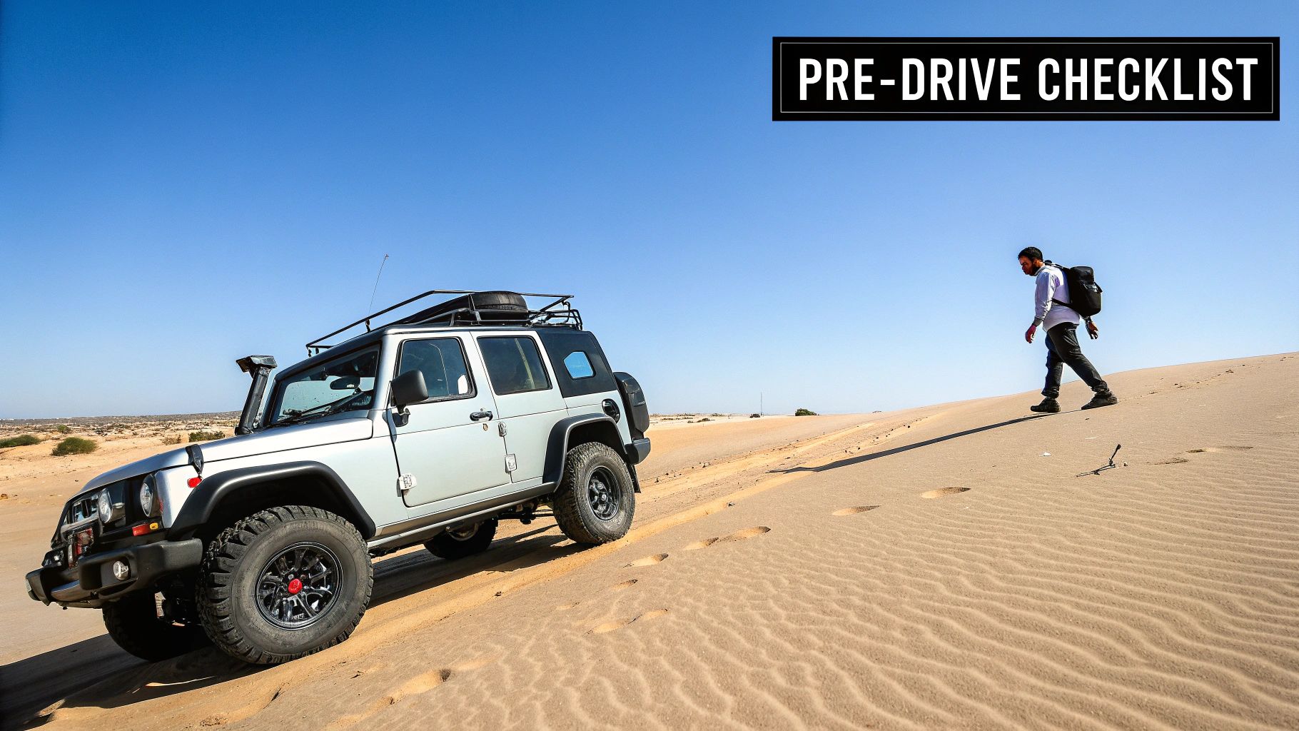 self drive desert safari dubai: Learn Dune Driving Essentials 1 A white 4x4 vehicle driving through the red sand dunes of the Dubai desert
