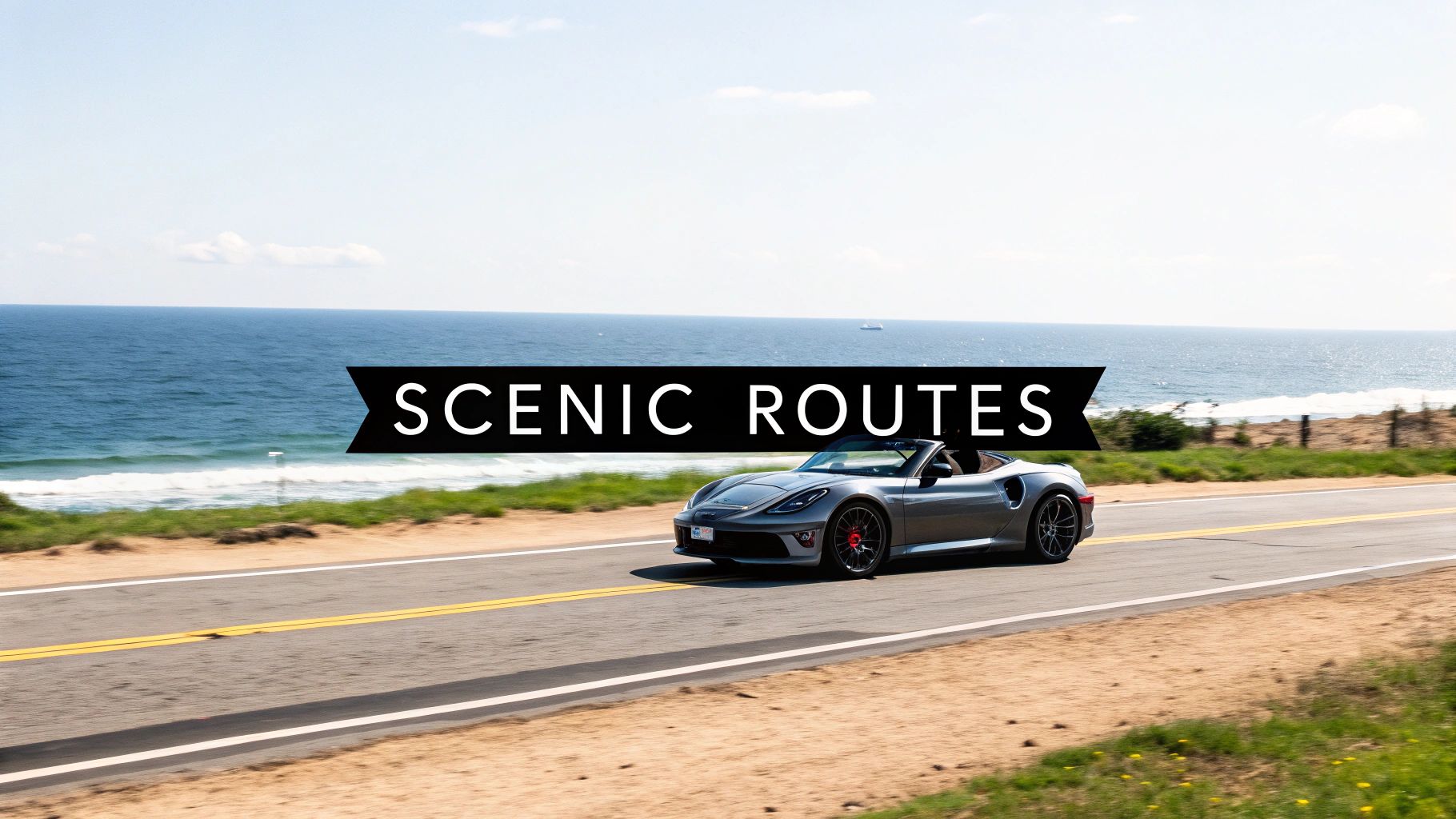 A sports car driving on a scenic road