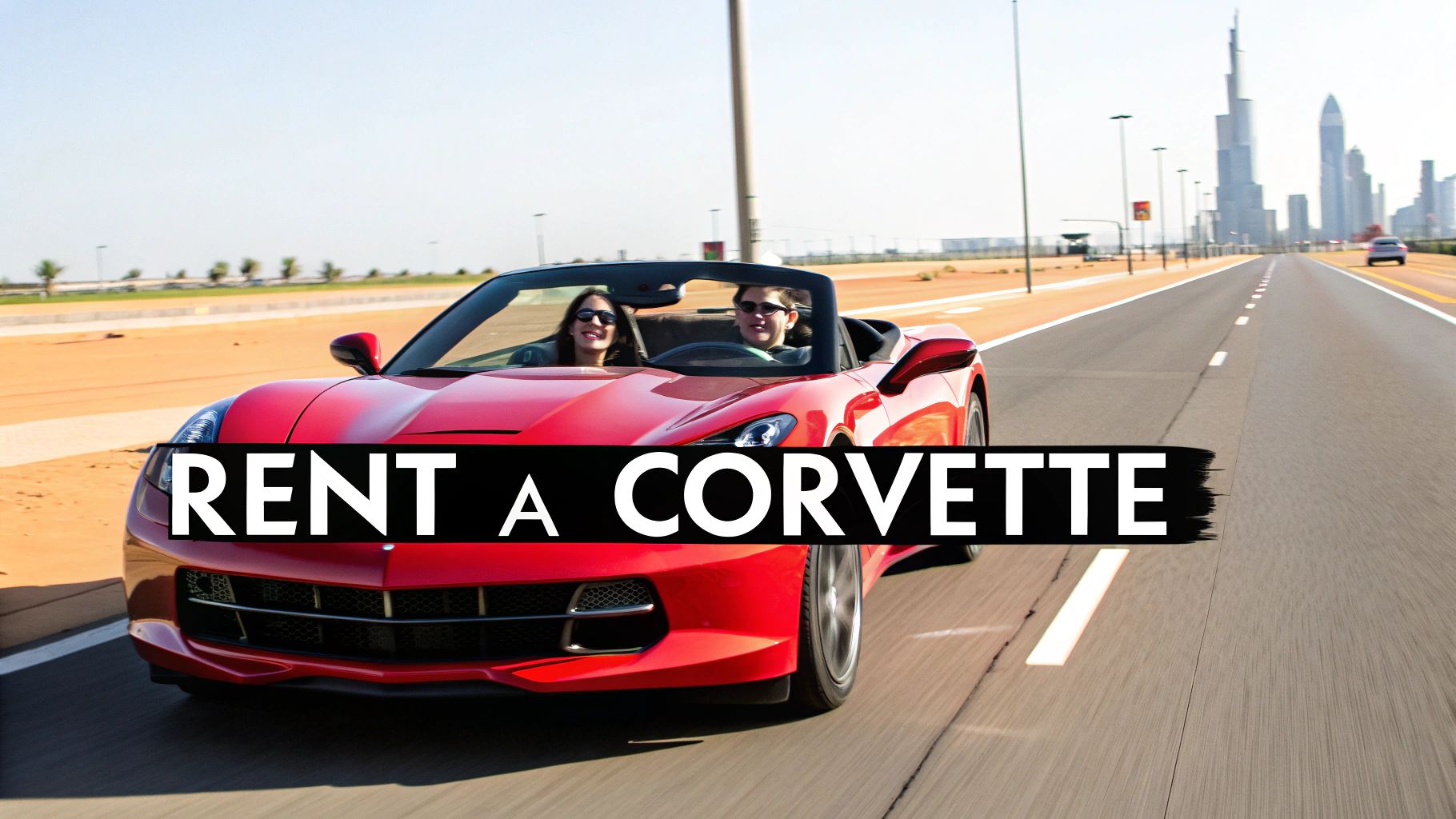 Corvette Price in Dubai: price of corvette in dubai Guide to Buying and Renting 3 Two smiling women in sunglasses driving a red convertible Corvette on a desert road in Dubai.