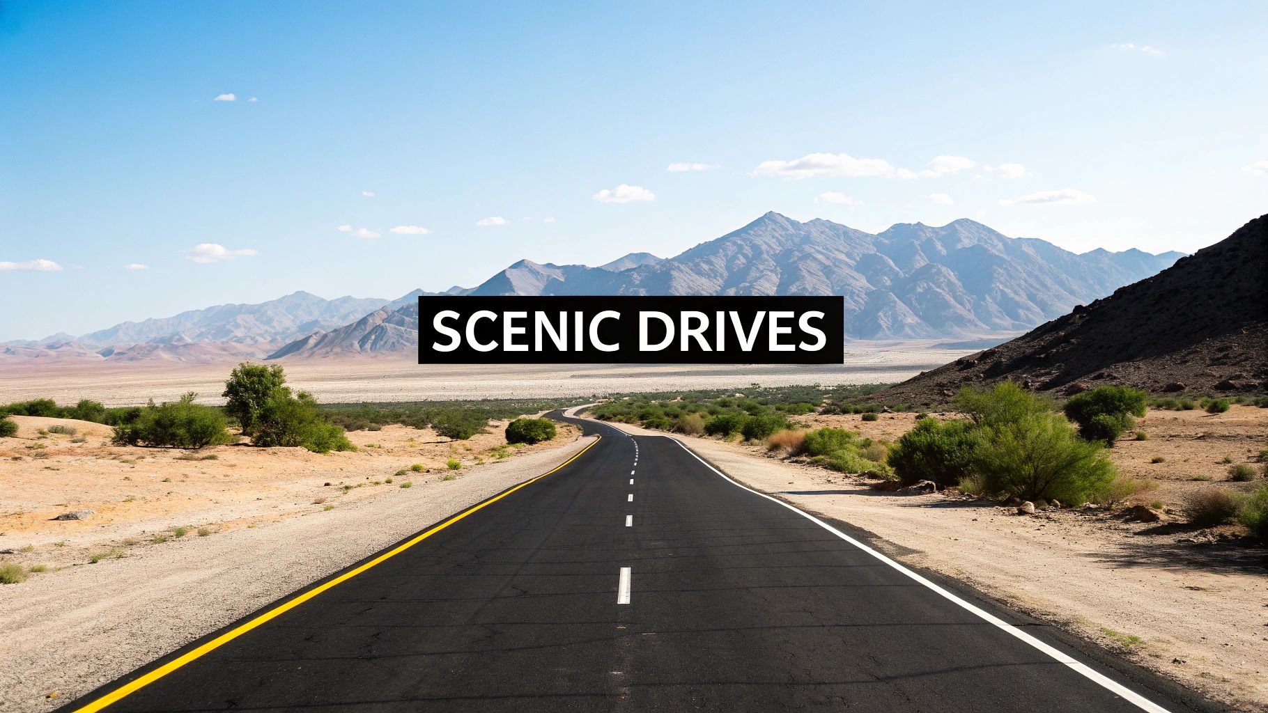 Dubai Road Map A Guide to Driving and Navigating 3 A scenic desert road with mountains in the background under a clear blue sky, featuring text 'SCENIC DRIVES'.