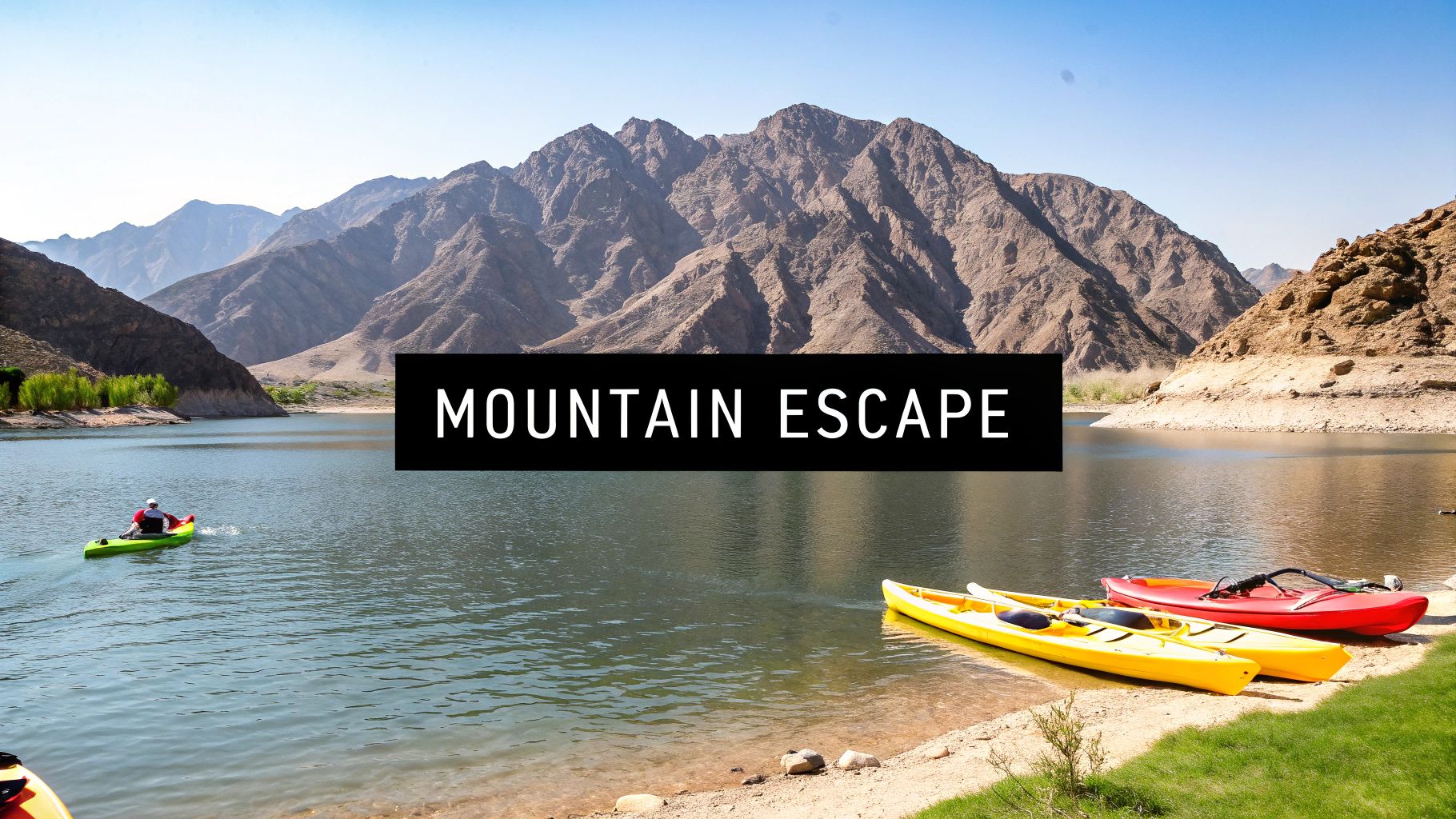 Hatta Dam with kayaks on the water and mountains in the background