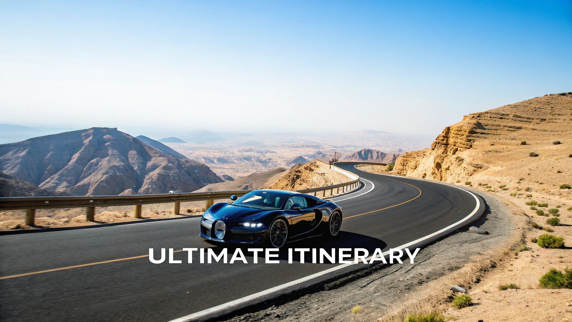 A sleek dark blue Bugatti hypercar drives on a winding desert mountain road under a clear sky.