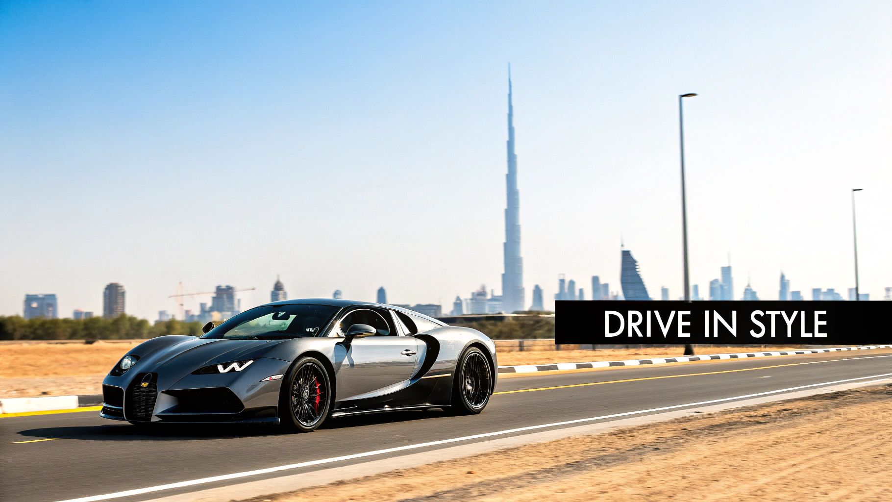 How to Rent an Exotic Car in Dubai: rent a exotic car the Right Way 1 A sleek grey luxury sports car drives on a desert road with the Dubai skyline and Burj Khalifa.