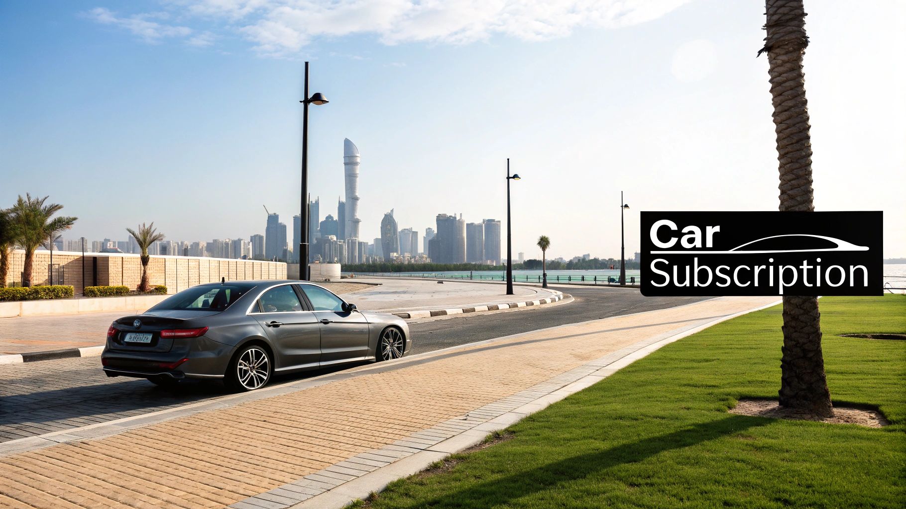 A modern grey car parked on a street with a city skyline and 'Car Subscription' sign.