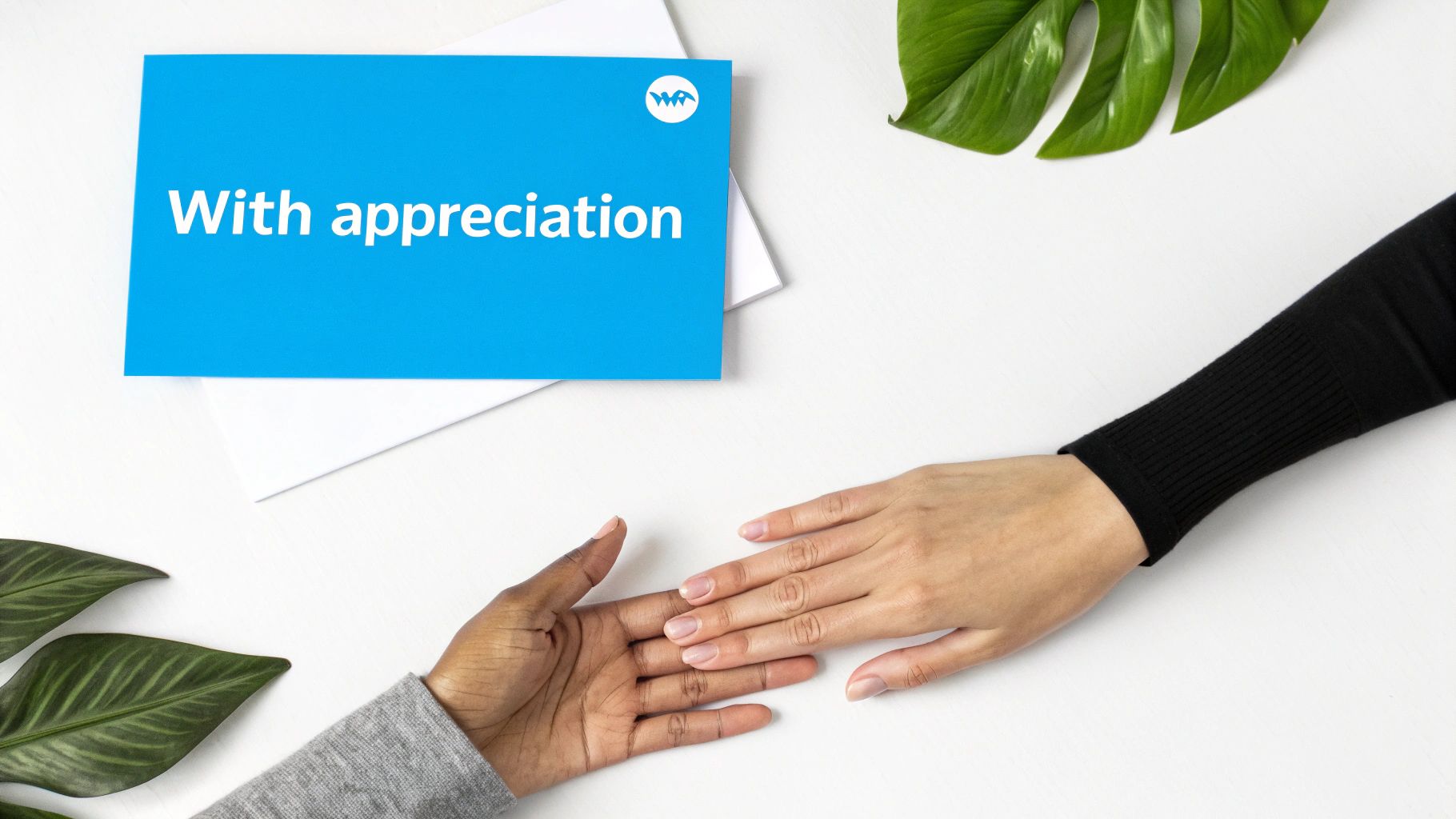 Two diverse hands reaching, with a blue 'With appreciation' card and green leaves on a white background.