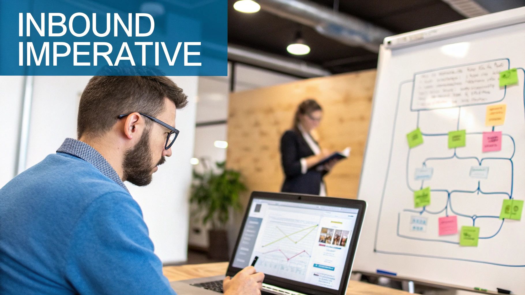 Man with glasses analyzing inbound marketing data on a laptop in a modern office setting.