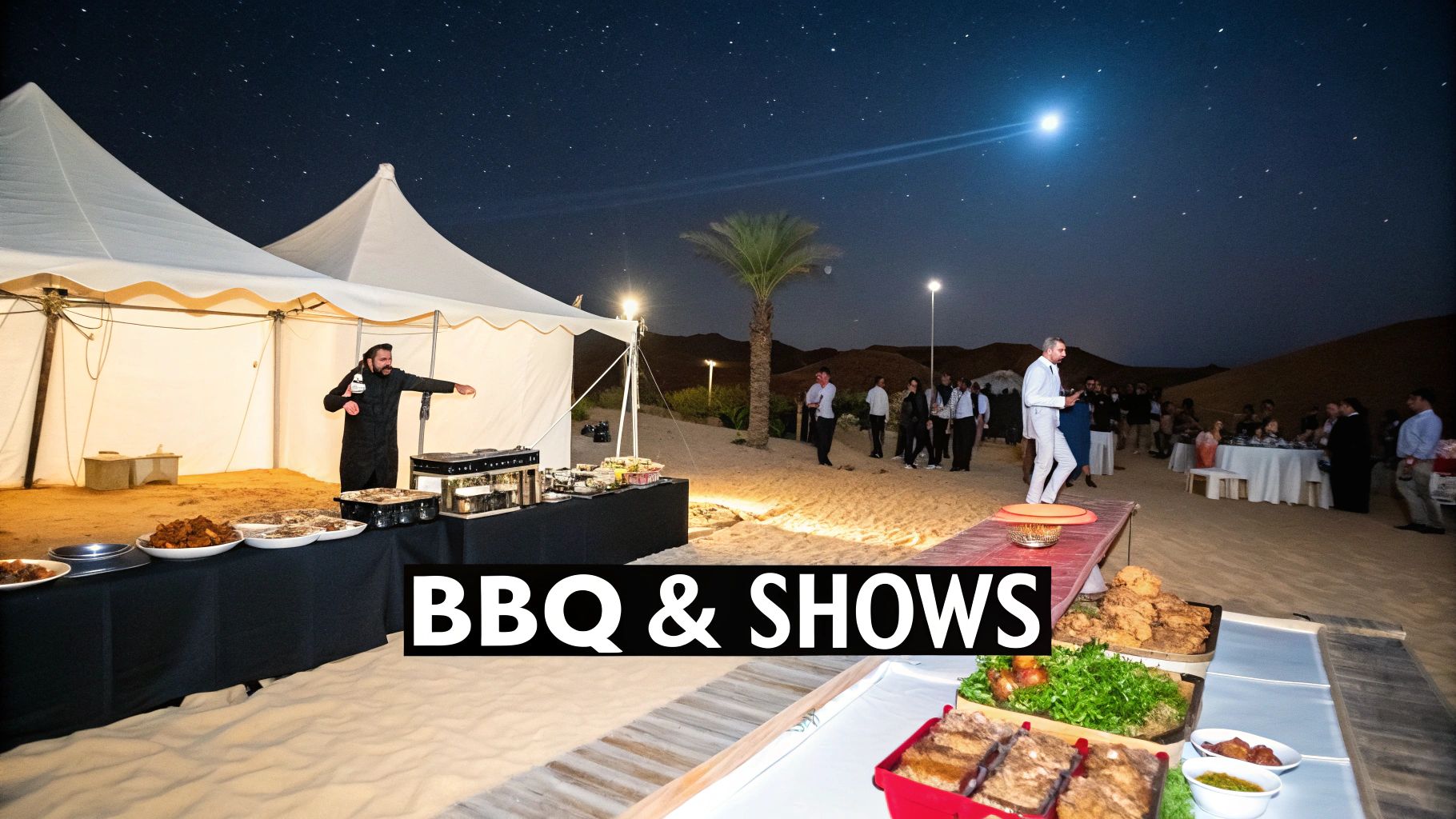 People gather for a lively BBQ dinner event under a starry desert night sky with white tents.