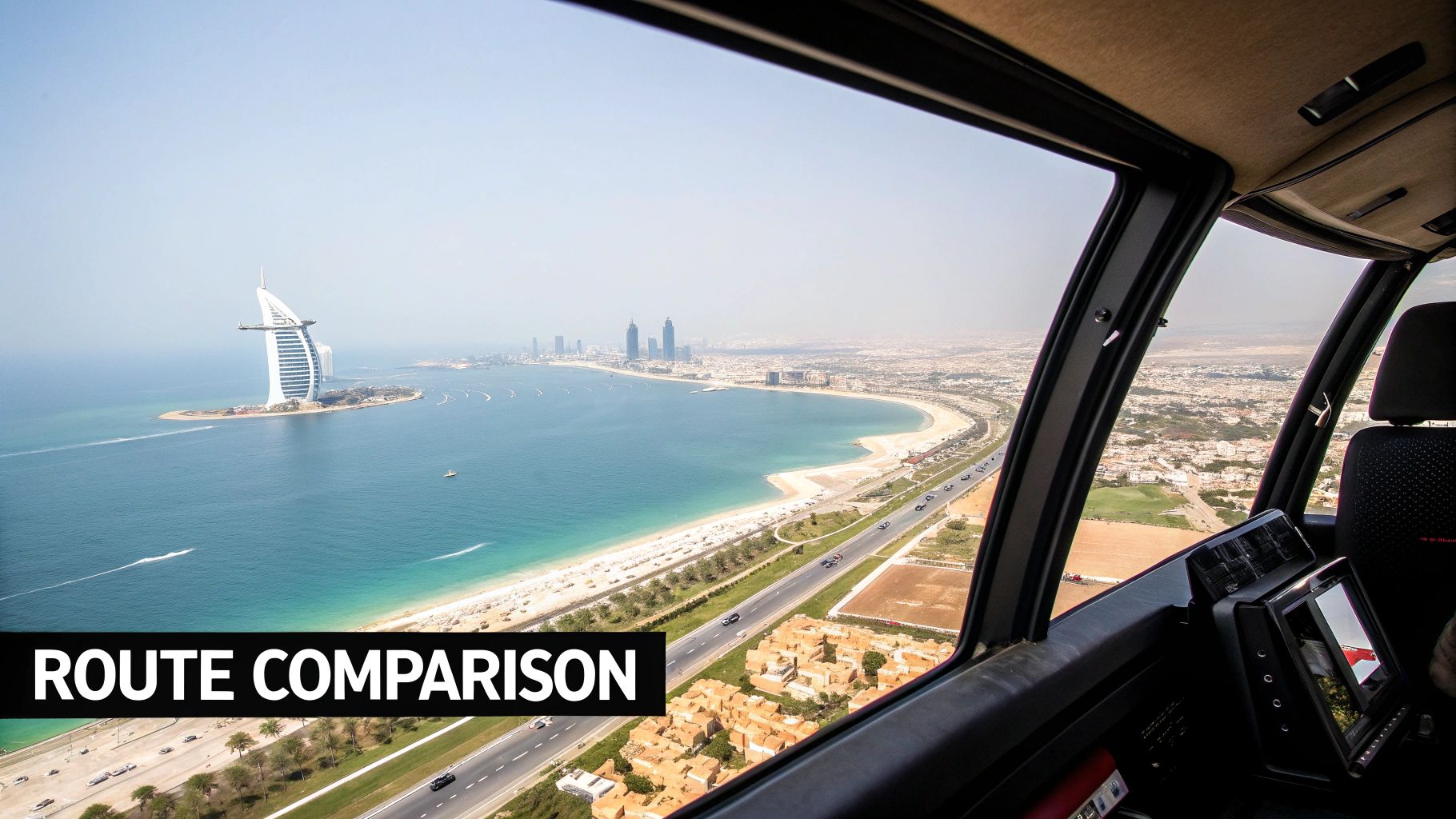 Aerial view from a helicopter cockpit showing Dubai's coastline, Burj Al Arab hotel, and cityscape.