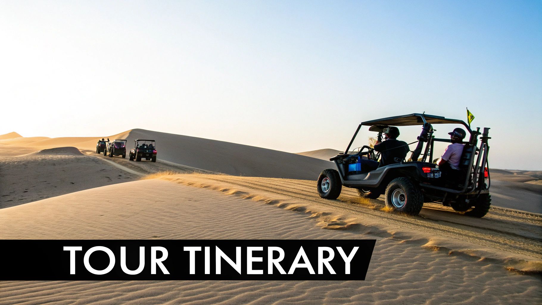 People driving several dune buggies across vast sand dunes during a desert safari at sunset.