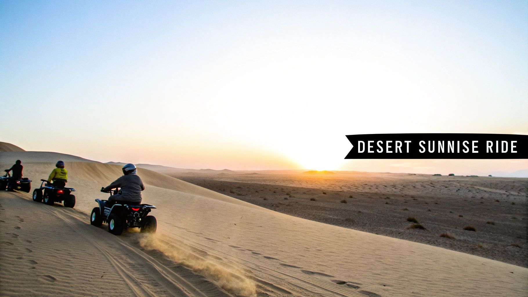 Dawn over desert with quad bikes