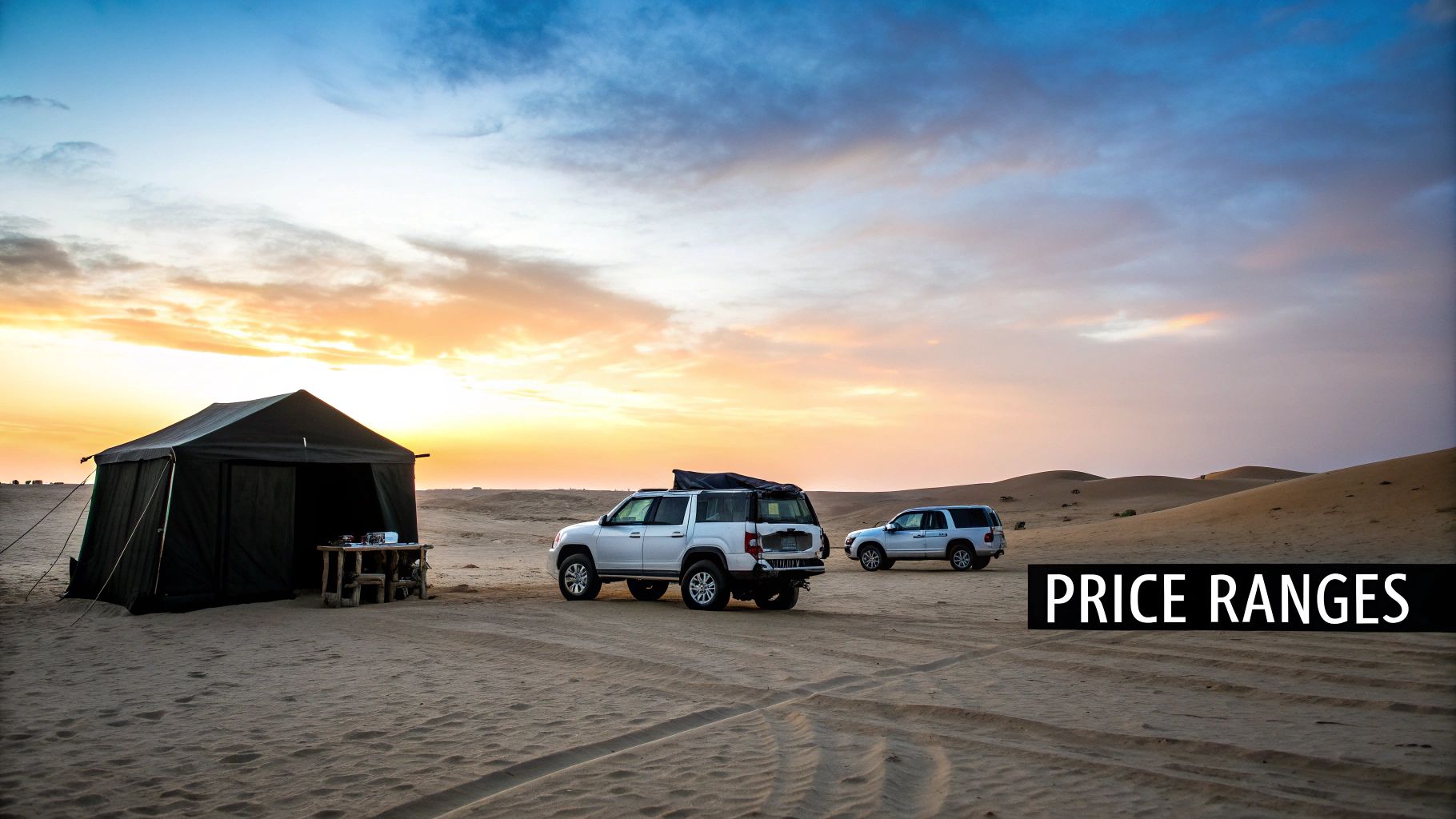 Two white SUVs and a black tent set up in a vast desert landscape under a colorful sunset sky.